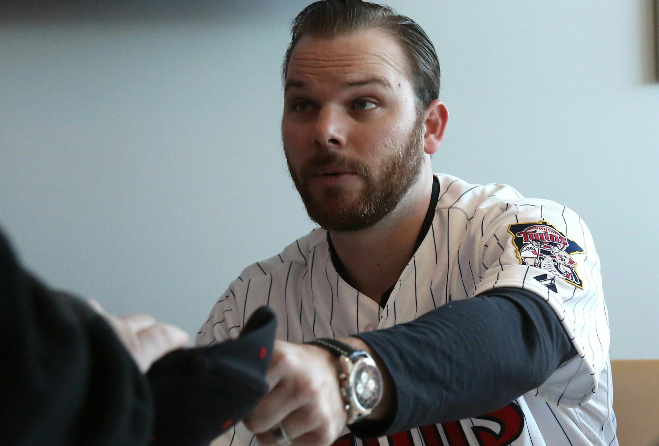 Jason Kubel signed his autograph on memorabilia brought by fans who waited in line to meet the Twins&#xed; player. ] JIM GEHRZ &#xef; jgehrz@startribune.com / Minneapolis, MN / January 25, 2014 / 9:00 AM BACKGROUND INFORMATION: The 2014 annual Twinsfest event was held at Target Field, January 24-26, with thousands of fans attending to meet their favorite players, get autographs, play games, tour Target Field and even enjoy a bite to eat.