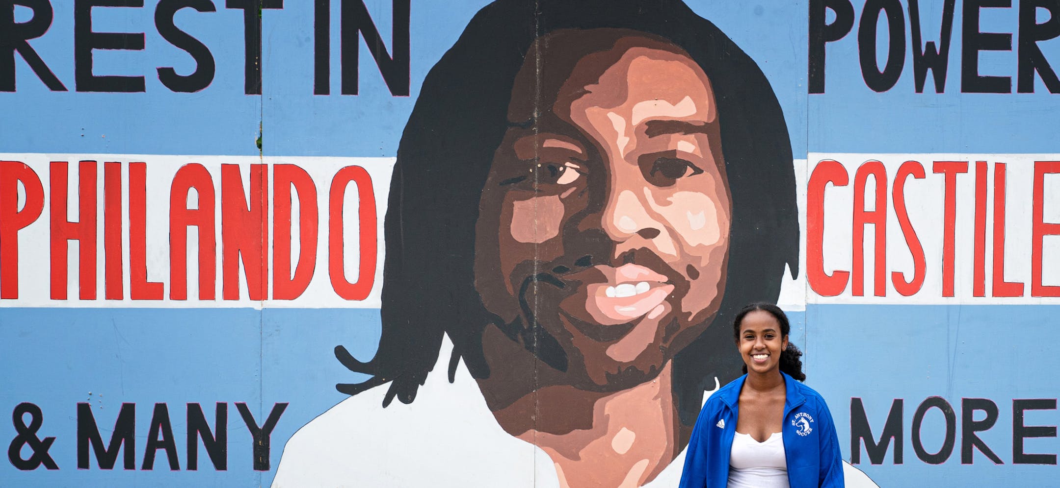 Semhar Solomon, senior at St. Anthony Village High School, is keeping pressure on city leaders after the council recently denied a proposed Philando Castile mural like this at the community center. Semhar painted this mural on plywood with friends and it is currently displayed in a former teacher's yard across the street from the Community Center, City Hall and the St Anthony Police Department. ] GLEN STUBBE • glen.stubbe@startribune.com Wednesday, July 22, 2020