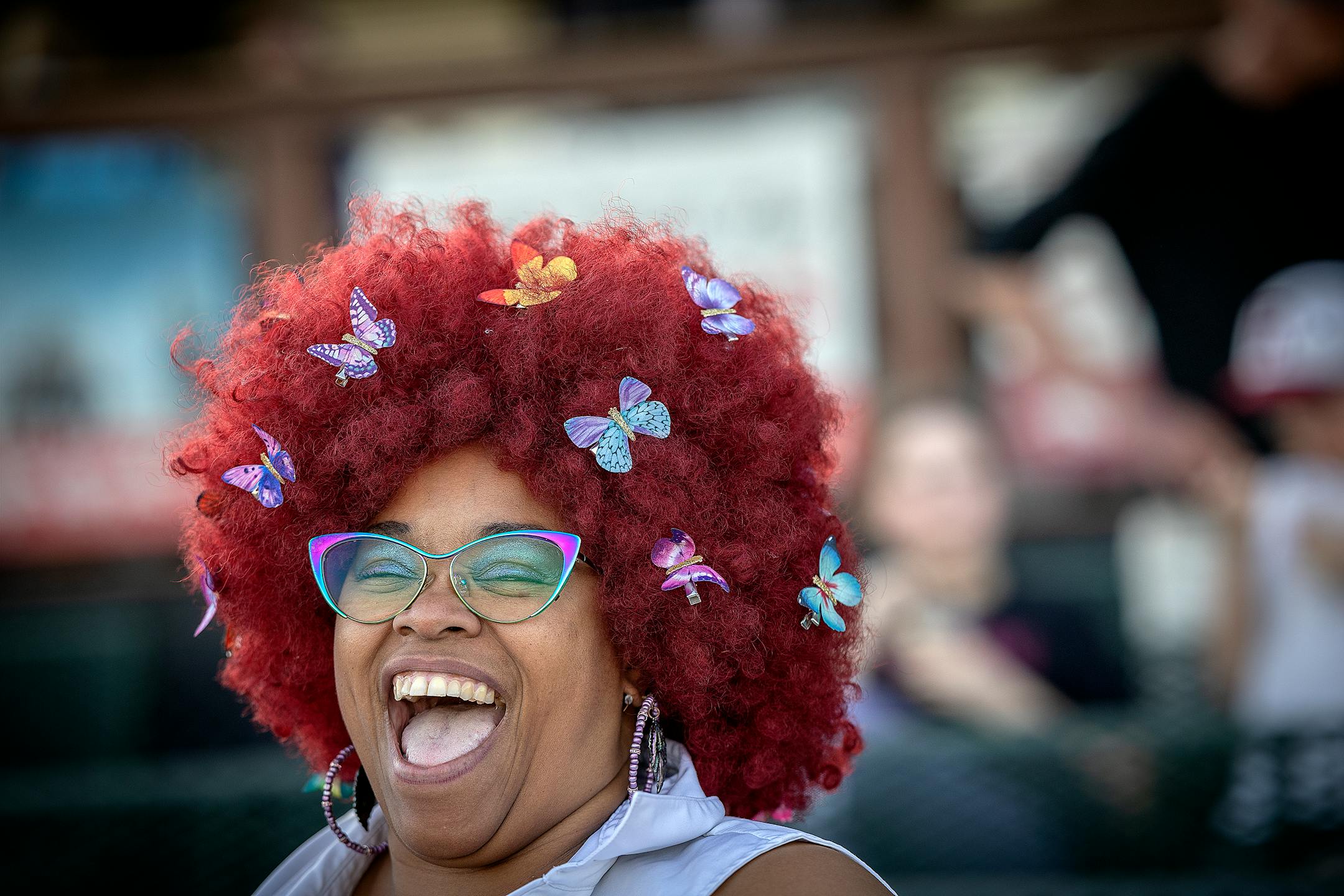 Shawnnell Batiste from Austin, TX, enjoys a race on opening night at Canterbury Park.