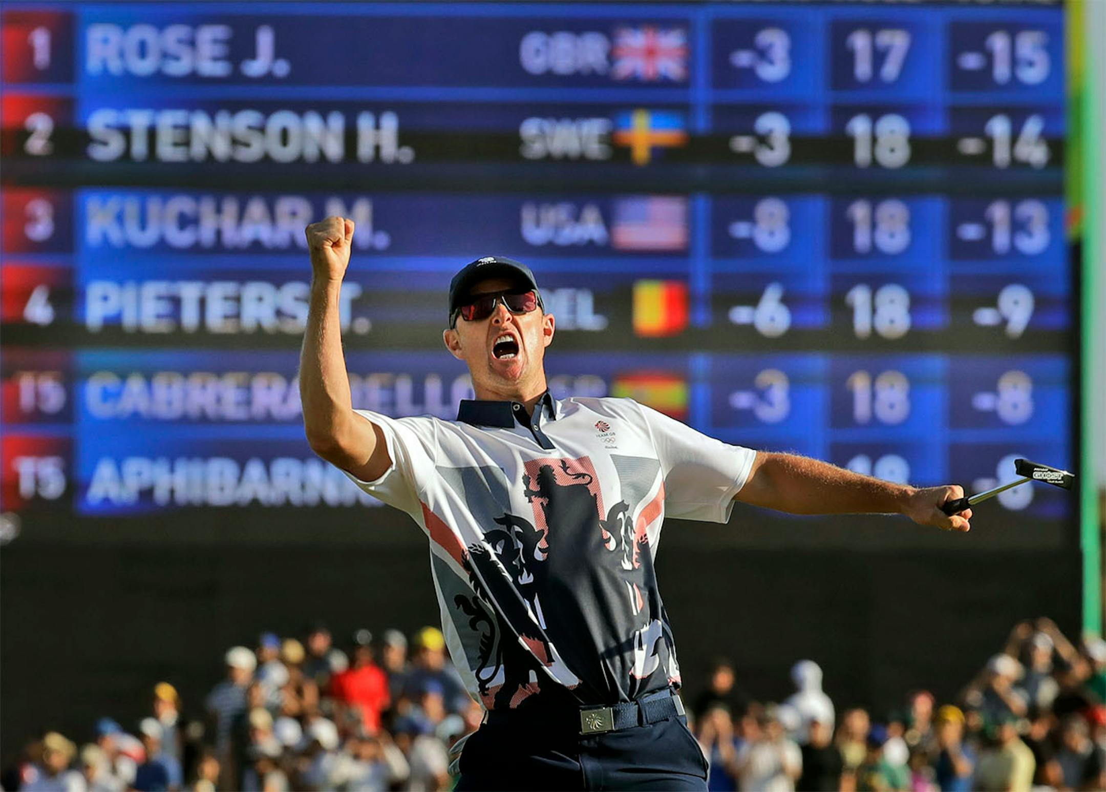 Justin Rose of Great Britain, wins the gold medal during the final round of the men's golf event at the 2016 Summer Olympics in Rio de Janeiro, Brazil, Sunday, Aug. 14, 2016.