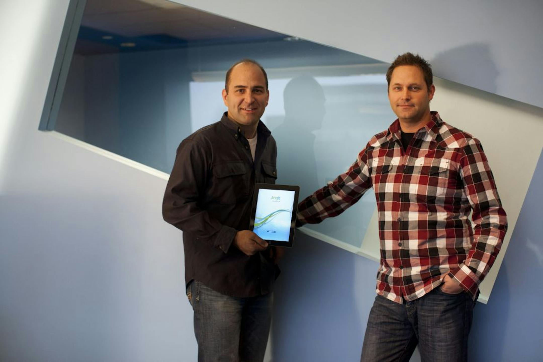 Todd Rooke and Joe Rogness started Jingit which is based in Bloomington, Minn. They were photographed Monday, November 21, 2011.