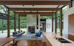 Innovative cedar and glass one-level living in the woods by ALTUS Architecture. ORG XMIT: MIN1808271444100778