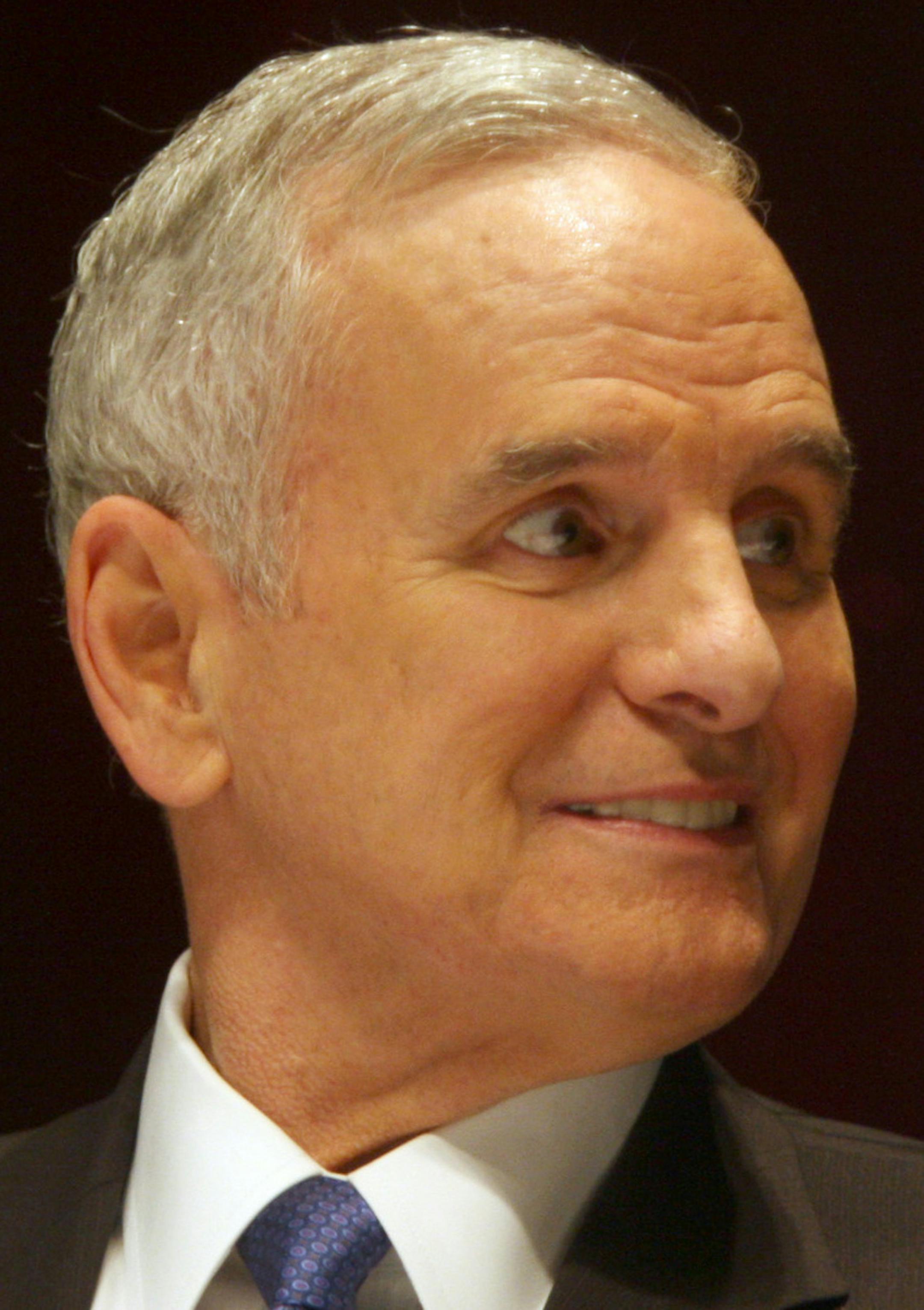Minnesota Gov. Mark Dayton looks on during a Minnesota gubernatorial debate at the Mayo Civic Center in Rochester, Minn., Wednesday, Oct. 1, 2014. The strength of Minnesota's economy put Democratic Gov. Mark Dayton and Republican nominee Jeff Johnson at odds Wednesday night in an opening debate that also saw skirmishes over health care and transportation. (AP Photo/The Rochester Post-Bulletin, Elizabeth Nida Obert)