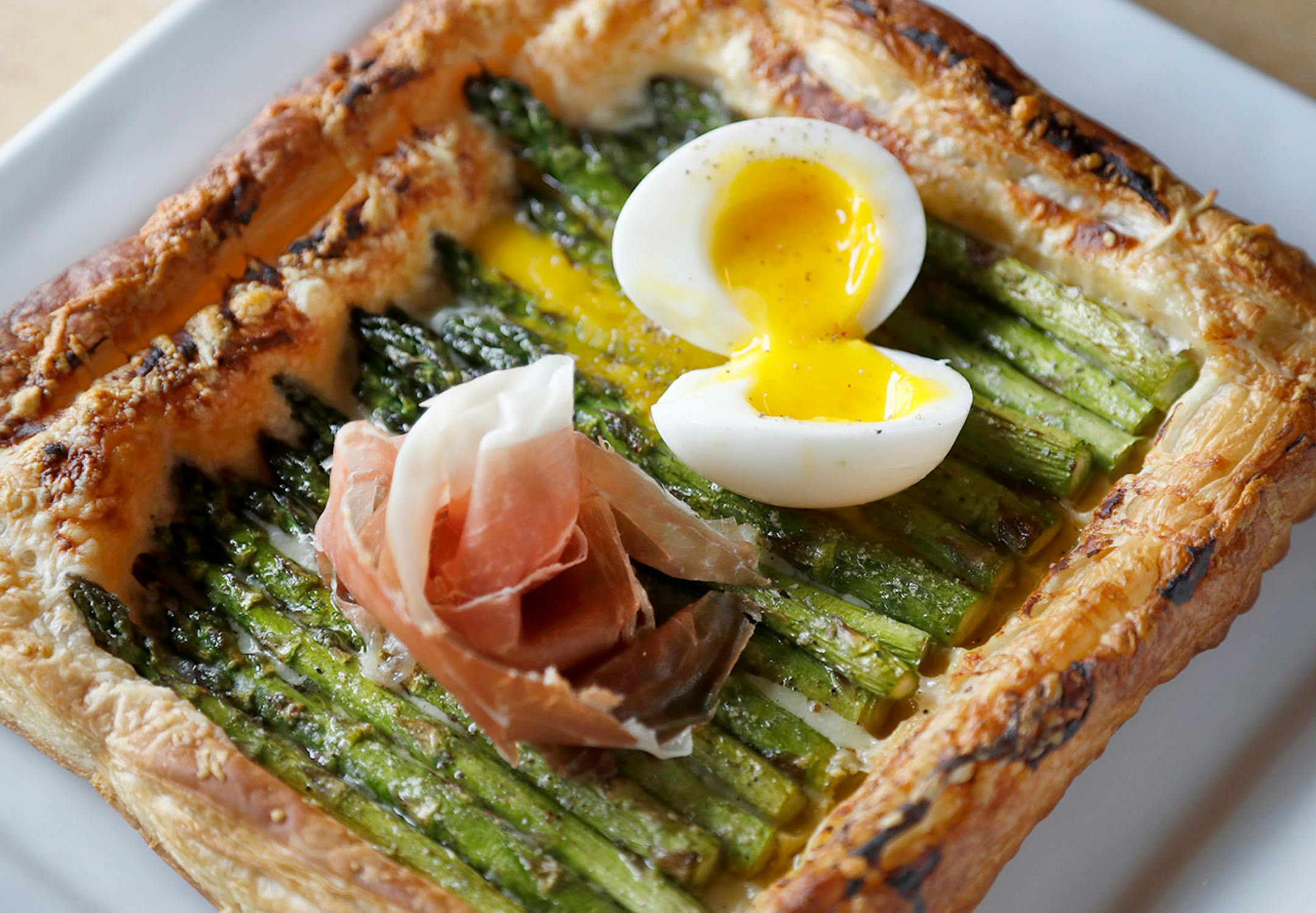 Asparagus Galette. Gruyere, Dijon, prosciutto, egg and lemon at the New Scenic Cafe up the shore north of Duluth.