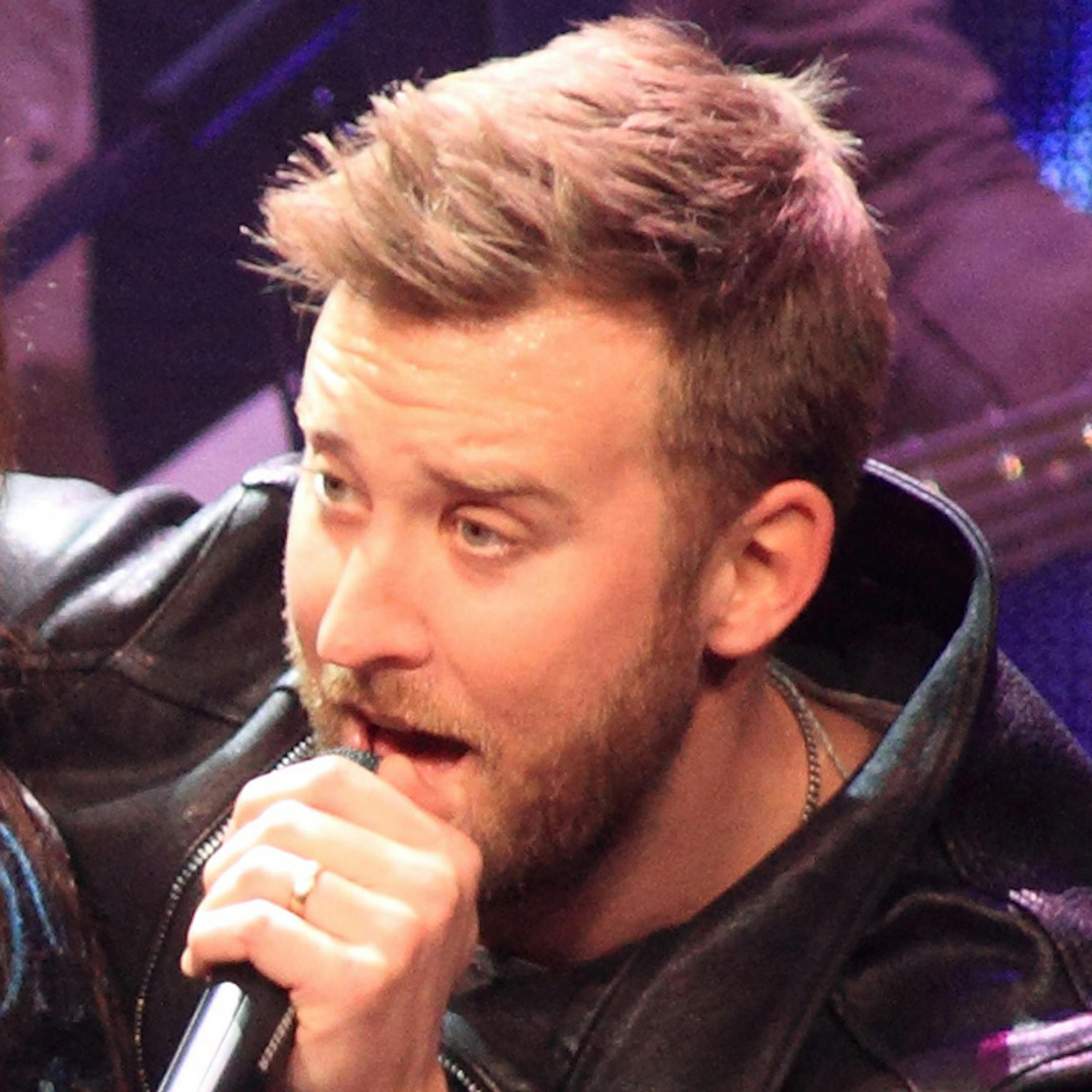 Dave Haywood, from left, Hillary Scott and Charles Kelley of the country pop music group Lady Antebellum perform in concert during their ìTake Me Downtown Tour 2014î at the Wells Fargo Center on Thursday, Jan. 30, 2014, in Philadelphia. (Photo by Owen Sweeney/Invision/AP)