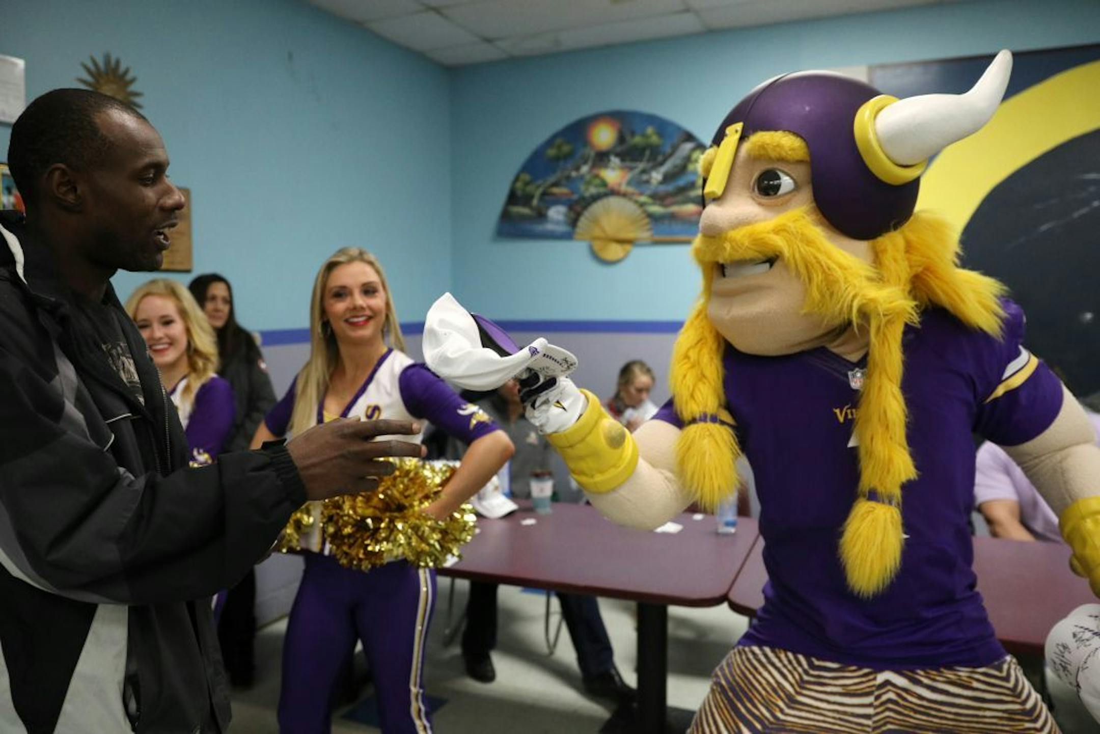 Viktor the Viking gave a hat to Donald Clark after his number was called during a raffle Tuesday.