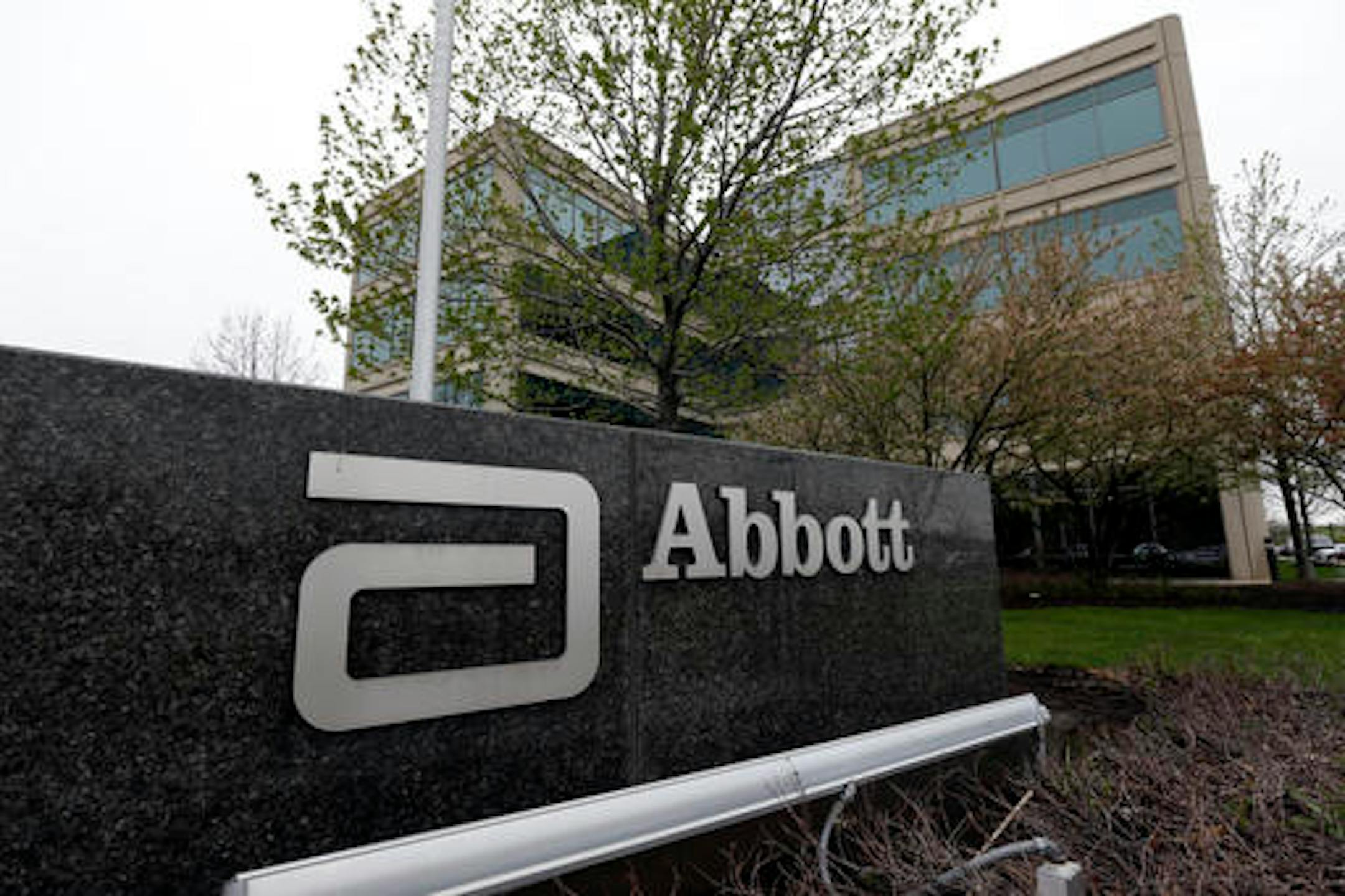 FILE - This Thursday, April 28, 2016, file photo shows a sign at an Abbott Laboratories campus facility in Lake Forest, Ill. Johnson & Johnson said Friday, Sept. 16, that it is paying more than $4.3 billion in cash to buy the eye health unit of Abbott Laboratories as it seeks to boost its vision business. (AP Photo/Nam Y. Huh, File)