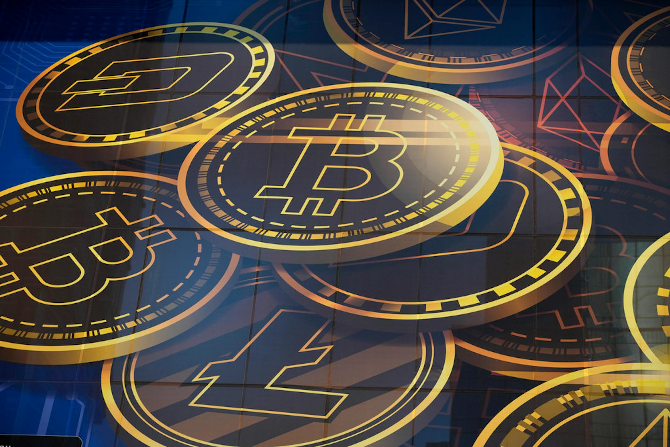 FILE - An advertisement of Bitcoin, one of the cryptocurrencies, is displayed on a building in Hong Kong, on Nov. 18, 2021. Bitcoin and other cryptocurrencies were collapsing in price Monday, June, 13, 2022 after the major crypto lender Celsius halted all withdrawals citing "extreme market conditions." It is the second collapse of a part of the crypto world in the last two months. (AP Photo/Kin Cheung, File)