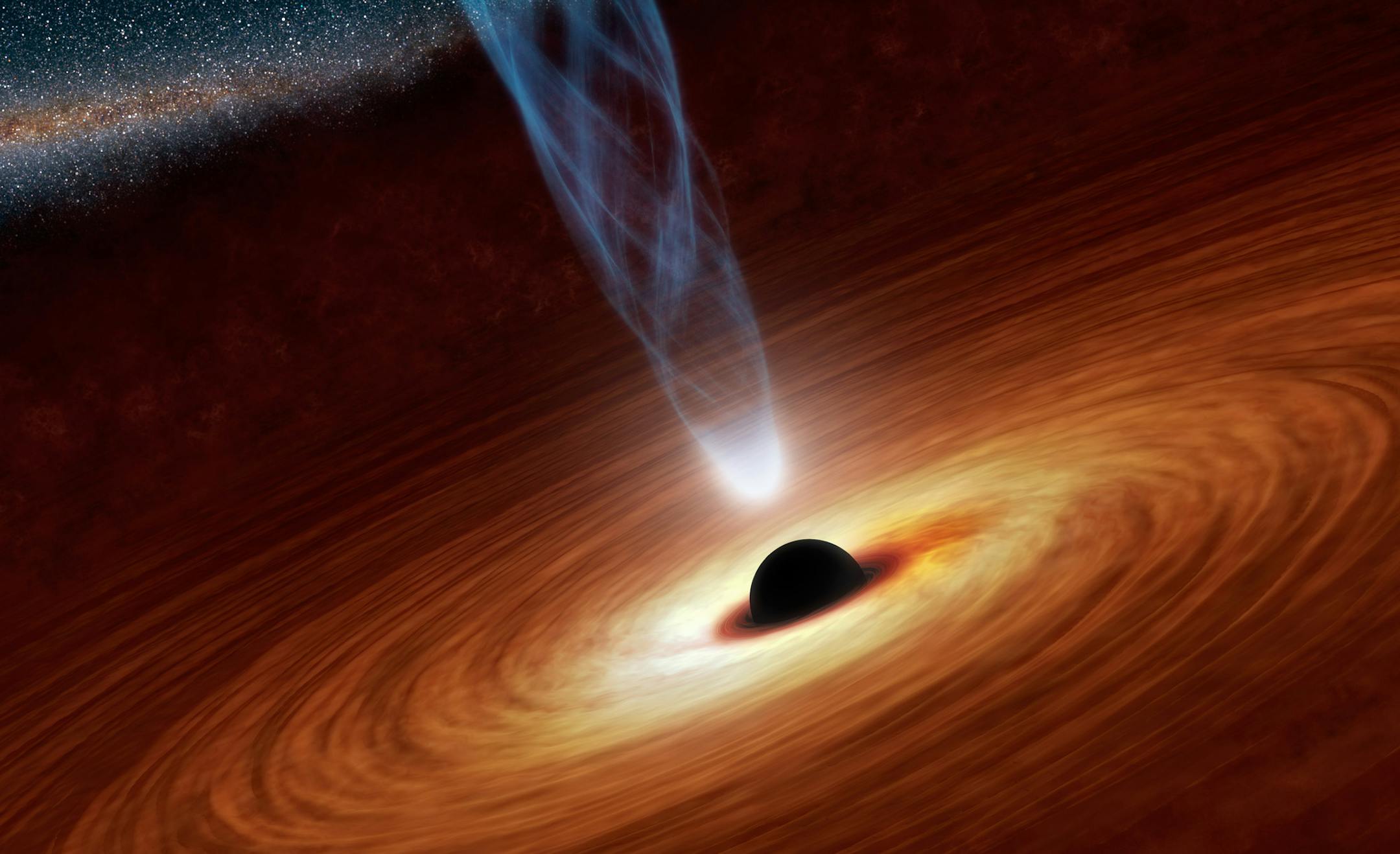 This illustration released by NASA, shows a supermassive black hole in the nearby spiral galaxy NGC 1365. A study published Thursday in the journal Nature calculated the spin rate of the black hole and found itís rotating close to the speed of light. (AP Photo/NASA)