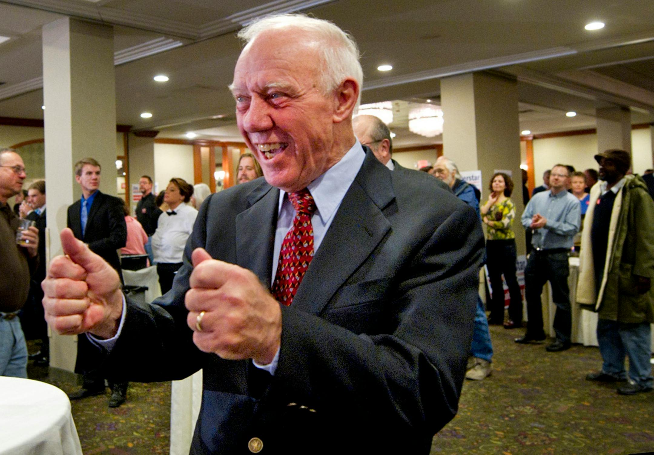 PLEASE CORRECT CAPTION TO SHOW DAVE BREWSTER/ STAR TRIBUNE MINNEAPOLIS NOT DULUTH NEWS TRIBUNE. Democratic Rep. James Oberstar reacts to election results on the large screen TV at his election night headquarters Tuesday Nov. 2, 2010 at the Holiday Inn Duluth, Minnesota. (AP Photo/The Duluth News-Tribune, Dave Brewster)
