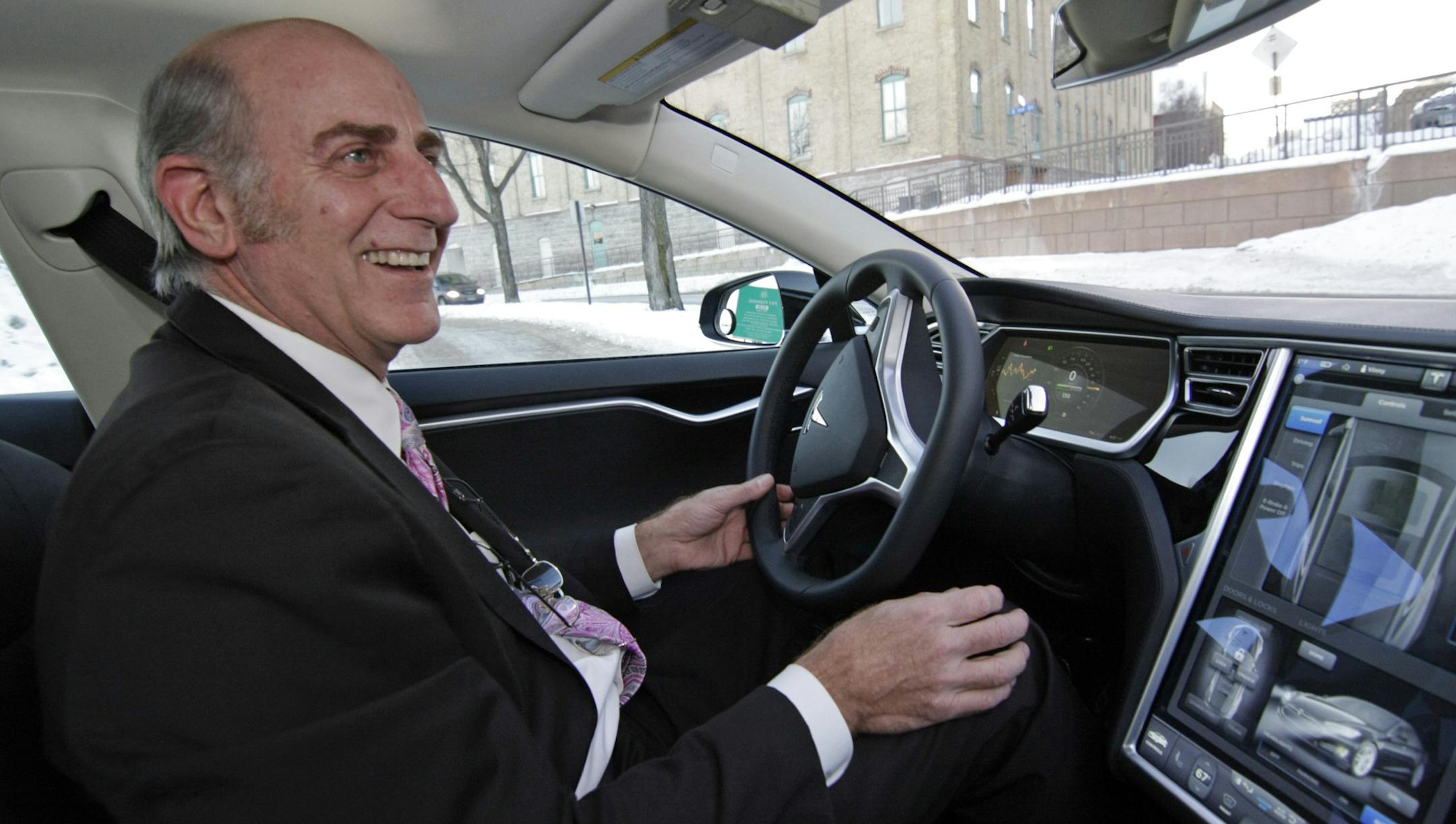 Track010514 - First fleet owned , electric powered Telsa limo in Minnesota. Operated by Vincent Vassallo - Vincent's Limosine Service. ] Tom Sweeney, 1/02/2014, Minneapolis, MN.