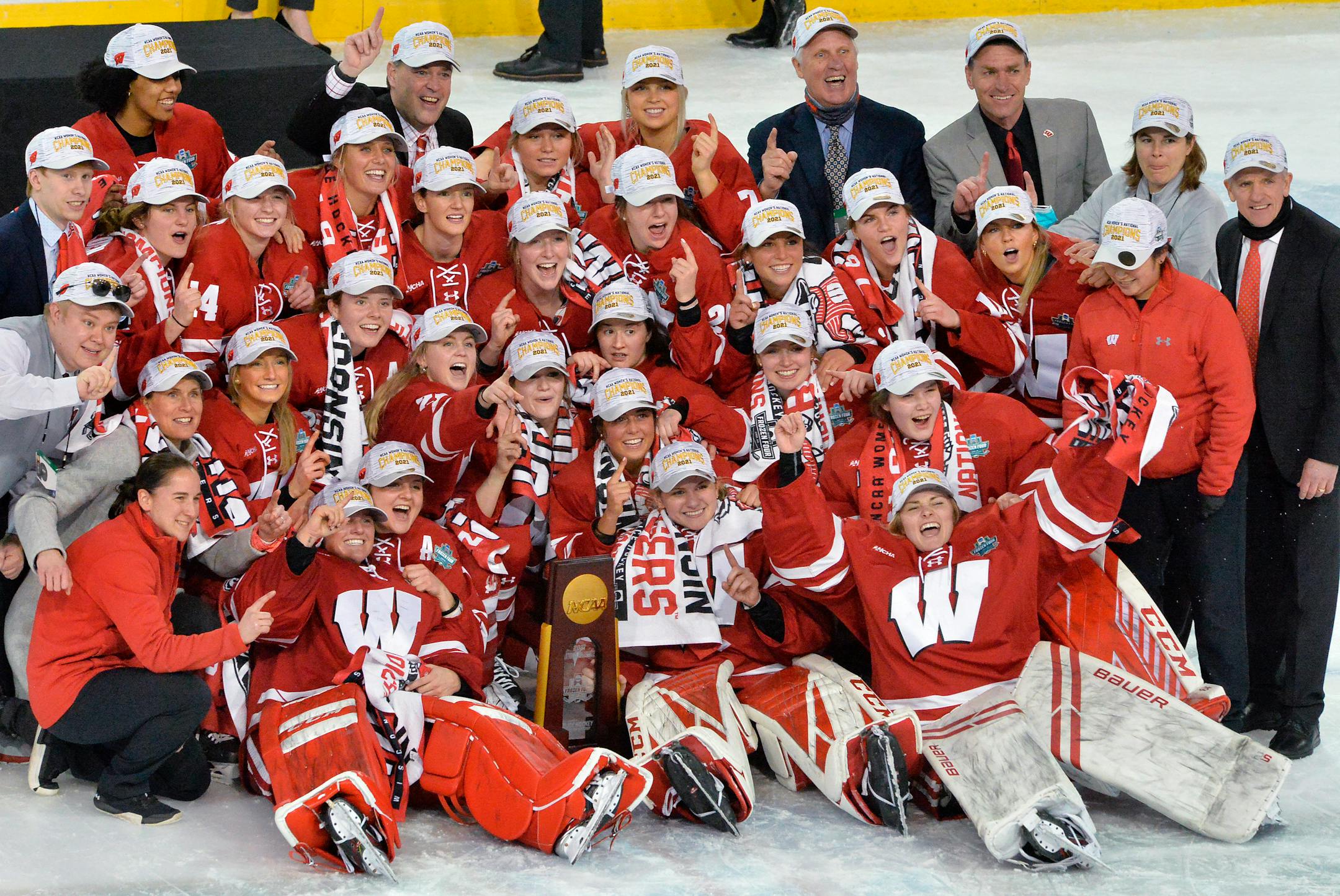 Wisconsin celebrates its NCAA Women's Frozen Four championship over Northeastern last March.