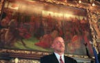 The morning after. -- Jesse Ventura at the Capitol during introduction by Gov. Carlson on Wednesday morning. He's standing in the Governor's Reception