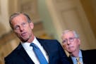 Sen. John Thune, R-S.D., on Capitol Hill with Sen. Mitch McConnell, R-Ky., in Washington, Sept. 21, 2021.