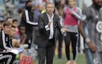 Minnesota United head coach Adrian Heath reacts on the sideline during the second half of an MLS soccer match against the Seattle Sounders, Sunday, Oc