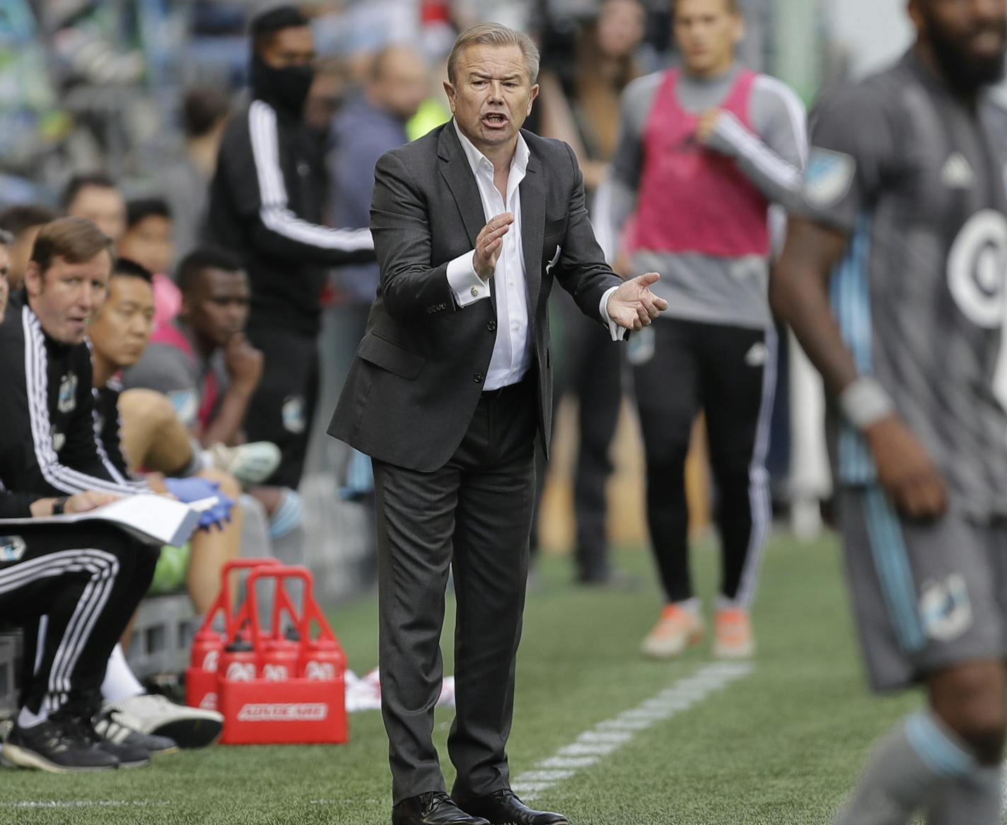 Minnesota United head coach Adrian Heath reacts on the sideline during the second half of an MLS soccer match against the Seattle Sounders, Sunday, Oct. 6, 2019, in Seattle. The Sounders won 1-0. (AP Photo/Ted S. Warren)