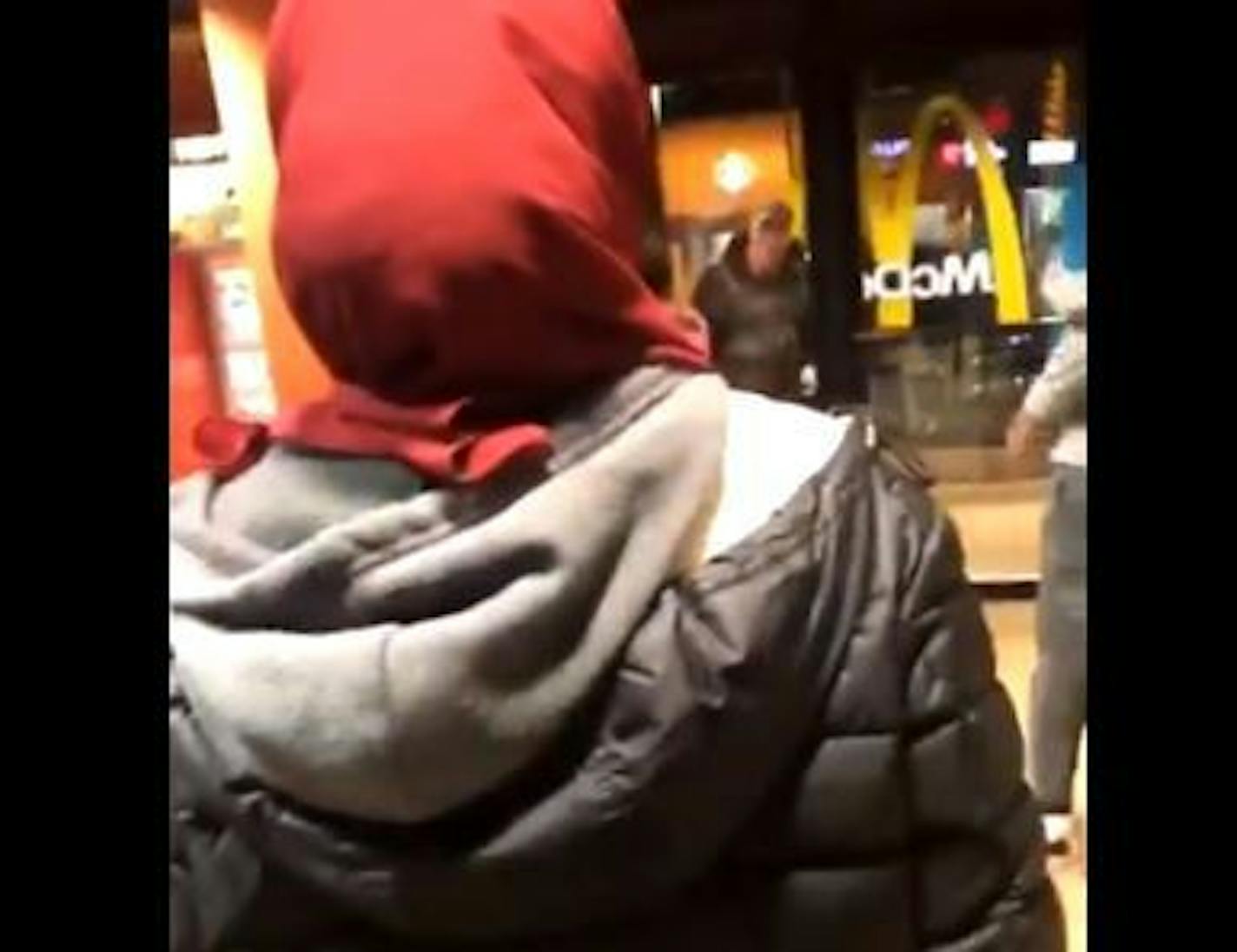 This screengrab from a video on Twitter showed a man who was shoved heading backward out the door of a McDonald's in Eden Prairie.