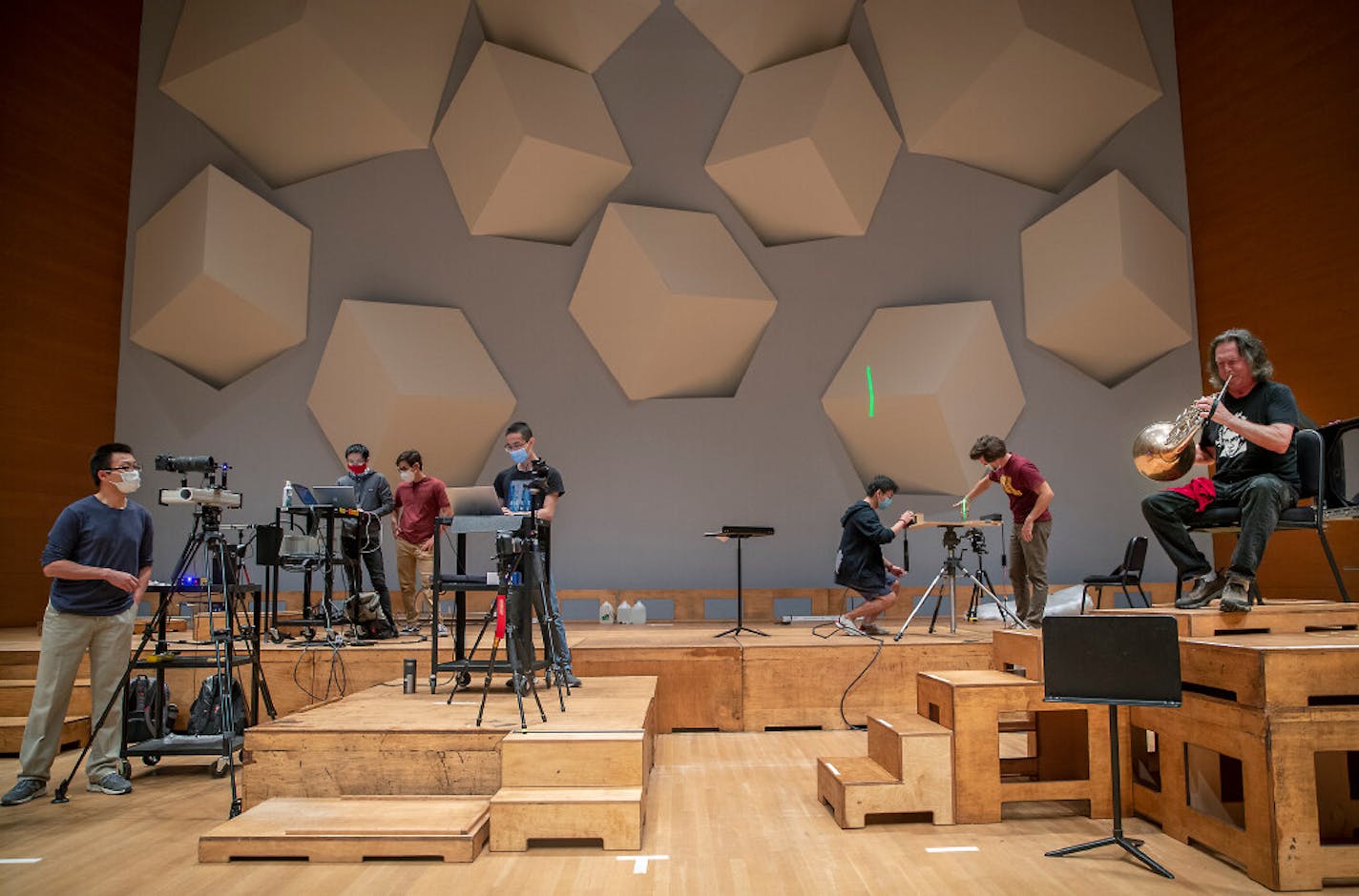 University of Minnesota Prof. Jiarong Hong and U students measured the aerosols released when the Minnesota Orchestra's Michael Gast played the French horn in August.