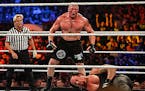 Brock Lesnar and The Undertaker battle it out at the WWE SummerSlam 2015 at Barclays Center of Brooklyn on August 23, 2015, in New York City.