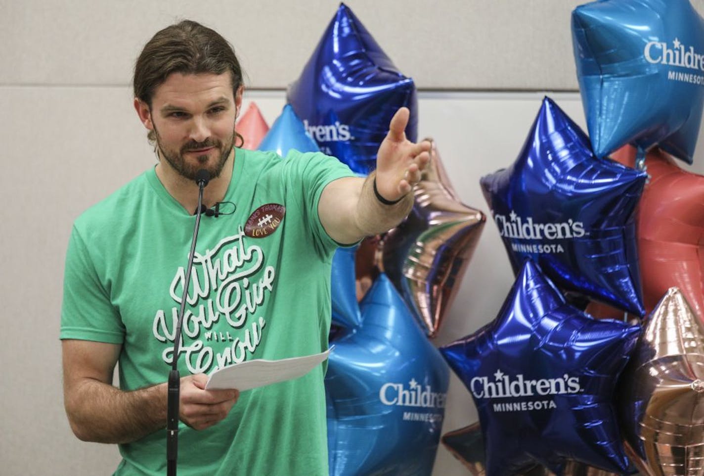 New Orleans Saints punter Thomas Morstead delivered a check for $221,143 to Children's Hospital Minnesota for all the donations Minnesotans gave to his foundation in New Orleans. Here, Morstead thanked all the Child Life staff who were on hand to thank him for the donation.