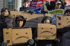 FILE -- Protesters opposed to Amazon's proposed New York campus on the steps of City Hall in New York, Jan. 30, 219. Amazon said on Feb. 14, that it w
