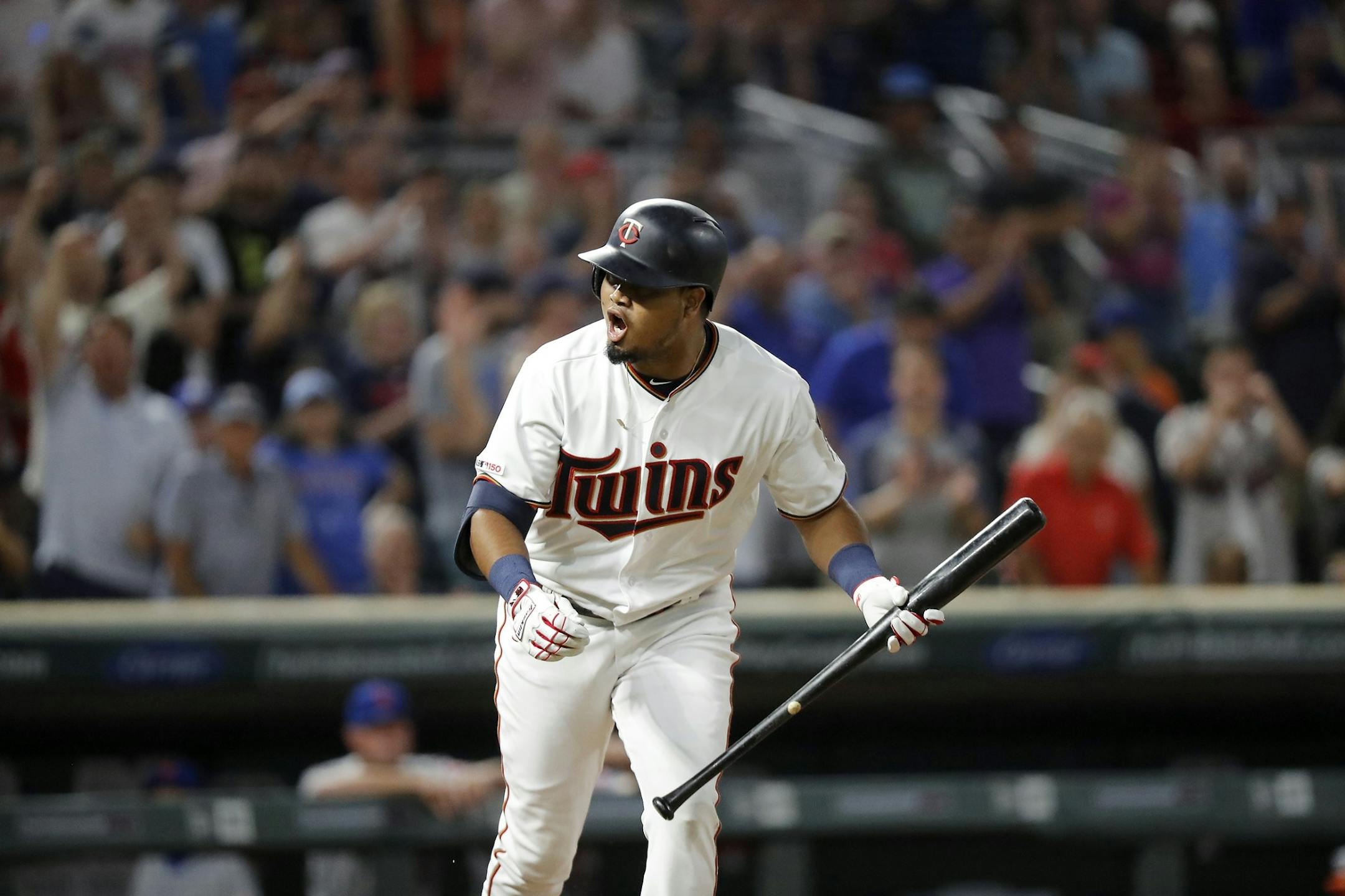 Minnesota Twins second baseman Luis Arraez (2) celebrates a walk in the ninth inning.