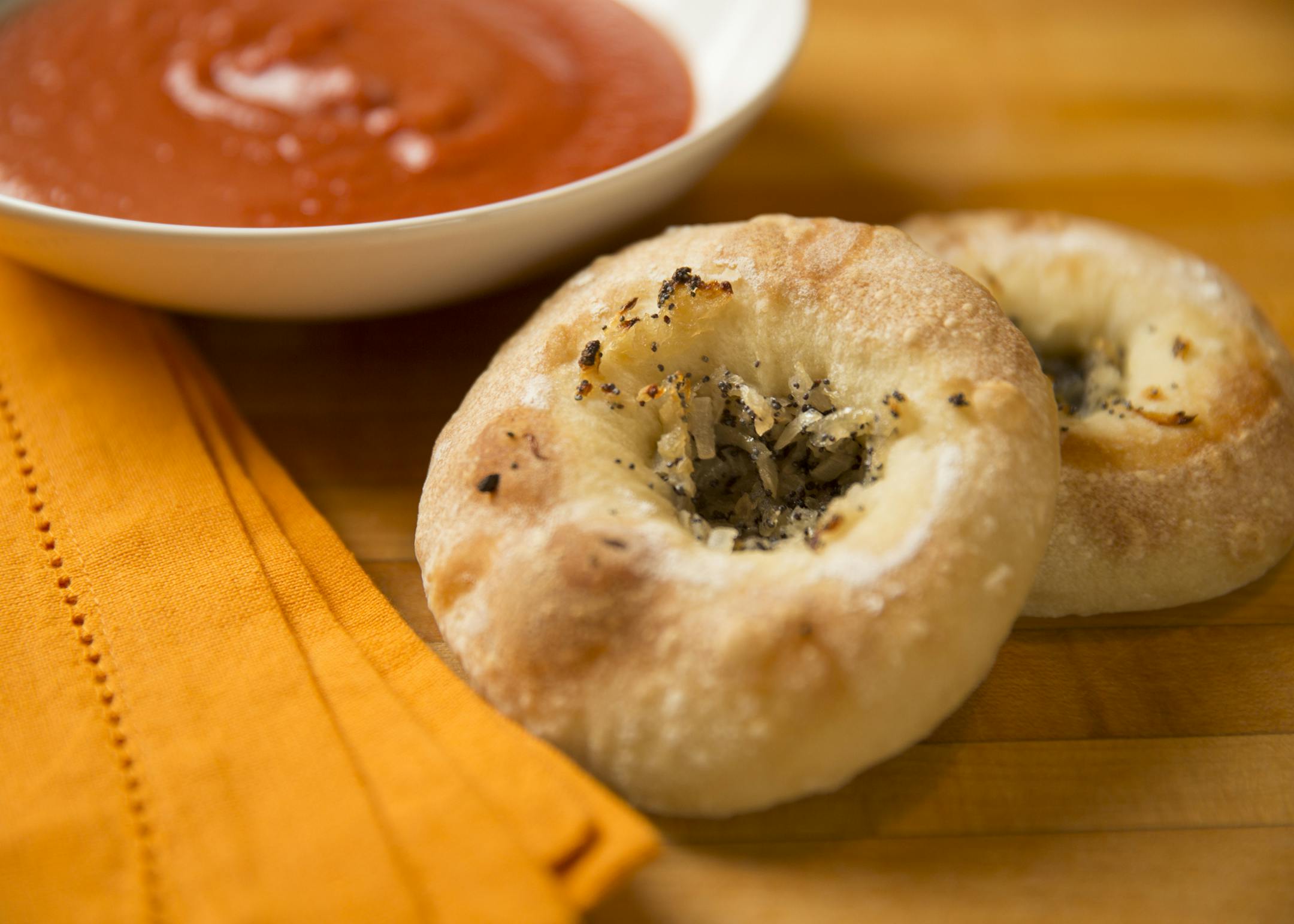 Baking Central makes bialys. ] (Leila Navidi/Star Tribune) leila.navidi@startribune.com BACKGROUND INFORMATION: Baking Central makes bialys, an onion and poppyseed filled bread of Eastern European fame, on Thursday, September 15, 2016.