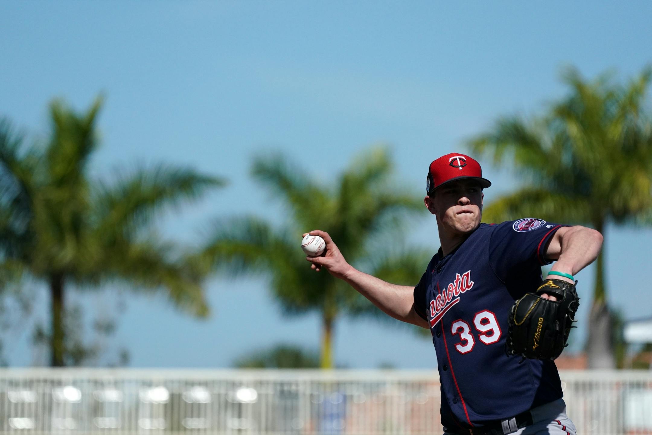 Twins pitcher Trevor Hildenberger (39) worked on throws to first at Hammond Stadium Thursday morning.