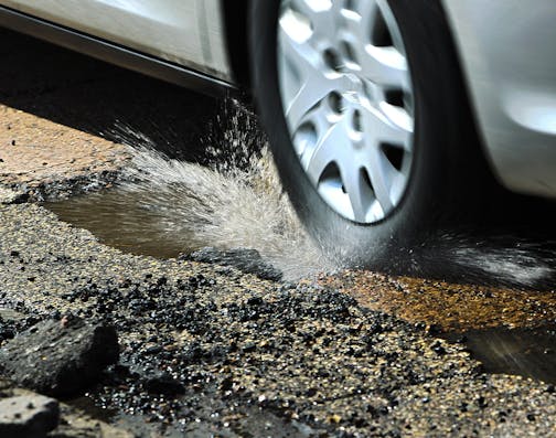 Cars driving on E. Minnehaha Parkway along Lake Nokomis tried to dodge potholes in the roadway Tuesday, April 23, 2013, in Minneapolis, MN.](DAVID JOLES/STARTRIBUNE) djoles@startribune.com On a stretch of West River Parkway, southbound drivers have been known to shift into the oncoming lane to avoid the plethora of potholes. The surface has been patched so many times that the jolting can leave a cyclist feeling scatter-brained. Help is on the way for this stretch of road, which will be closed ne