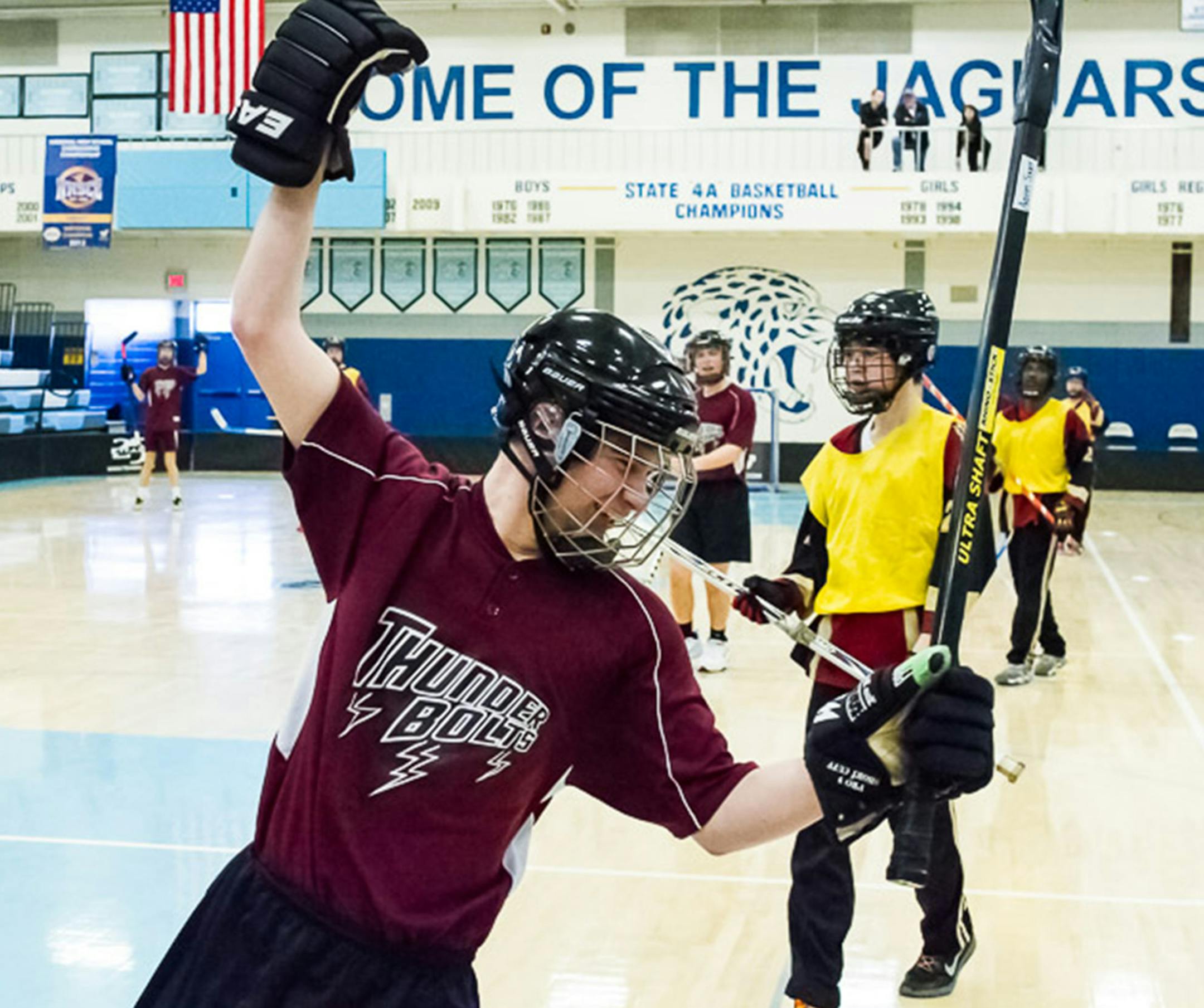 Thunderbolts senior Tristan Rankin celebrates a goal against Maple Grove at the state tournament in Bloomington. Photo by Steve Rooker