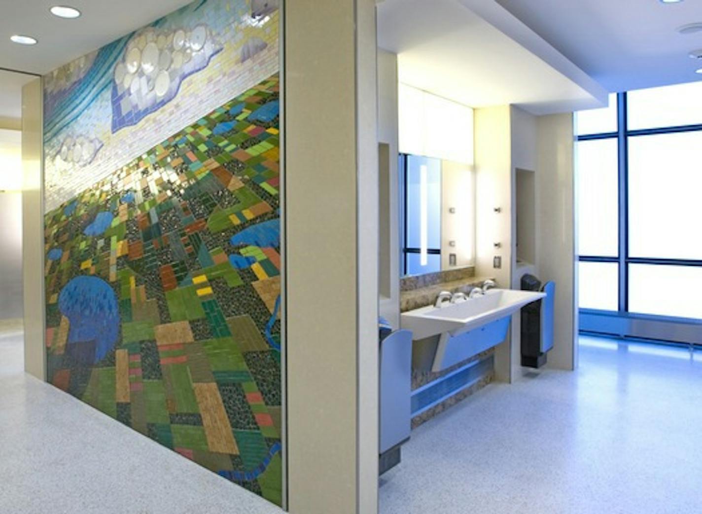 This prototype women&#x2019;s room at MSP airport includes a mosaic by local artist Michael Sweere.