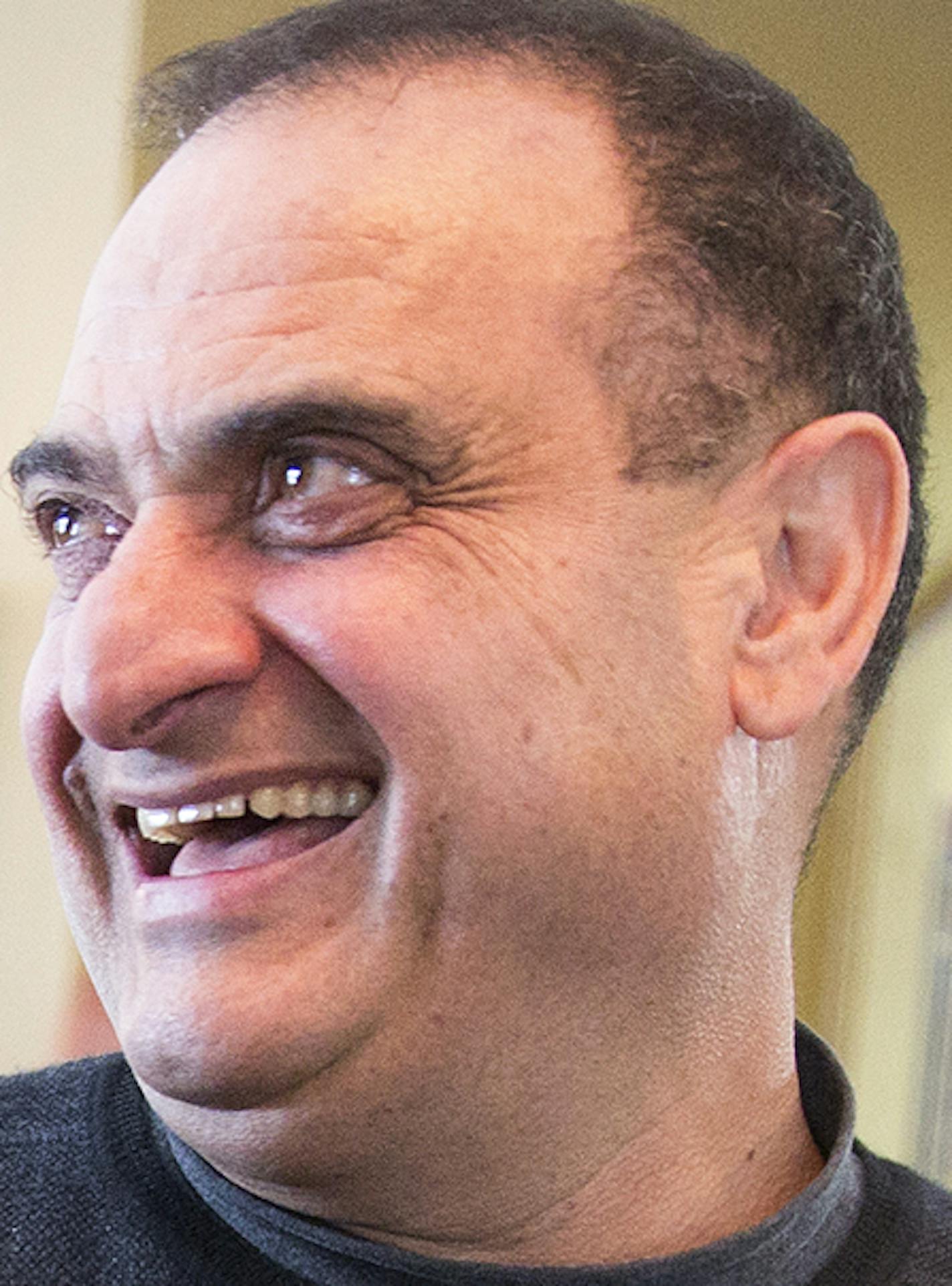 Karmel Mall owner Basim Sabri, right, talks with Robleh Jma, a security guard at Karmel Mall, after Friday prayers at the new mosque on the third floor of the mall in Minneapolis on Friday, February 20, 2015. ] LEILA NAVIDI leila.navidi@startribune.com / BACKGROUND INFORMATION: The project to add an additional floor to Minneapolis' oldest Somali mall made news last year when part of the construction collapsed, cutting off electricity to neighboring businesses. Now, Basim Sabri, the Karmel Mall's