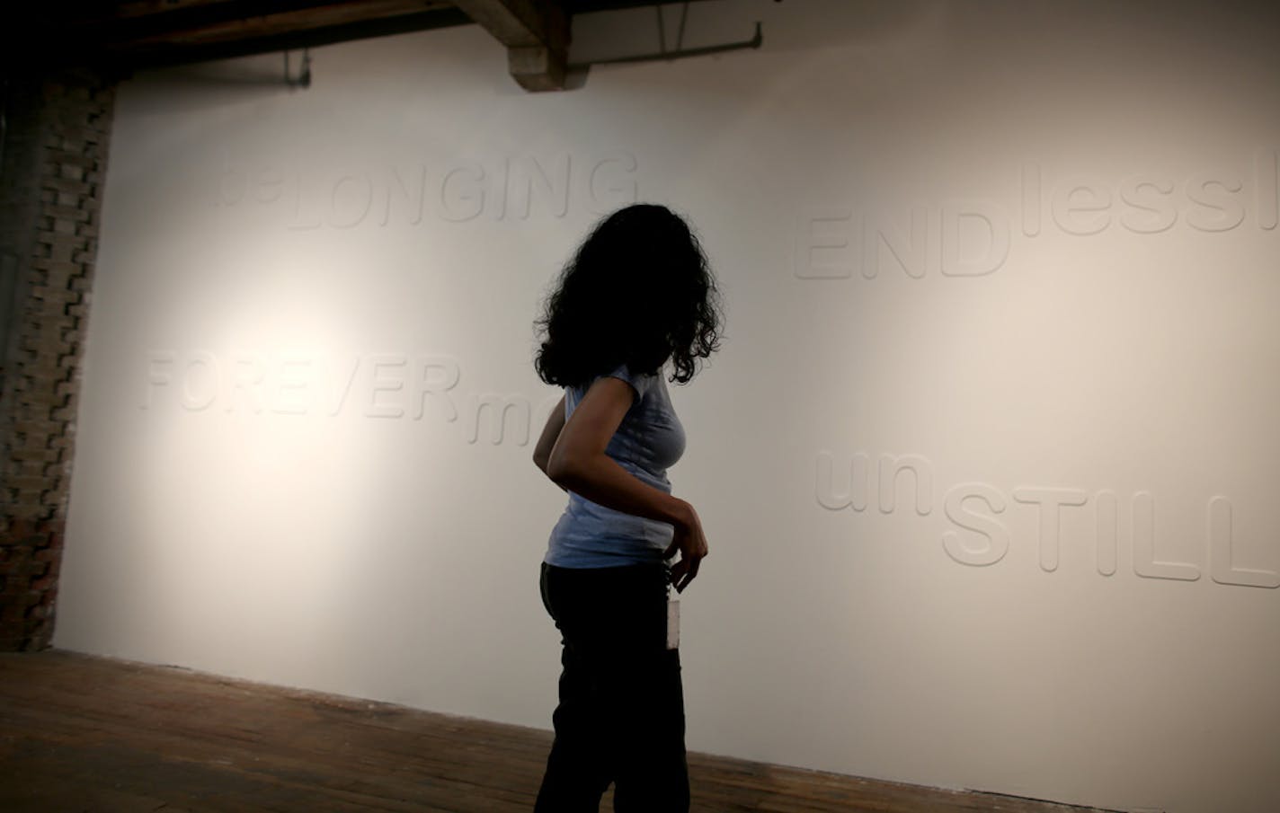 Artist, Pritika Chowdhry stood in front of her piece which is a part of the 4th Midwest Biennial exhibit at the Soap Factory. ] (KYNDELL HARKNESS/STAR TRIBUNE) kyndell.harkness@startribune.com New exhibit at the Soap Factory in Minneapolis Min., Thurday September 10, 2015.