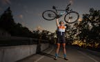 Alix Magner posed with her bike on Ohio Street, where she completed her 'Everesting' trip. ] LEILA NAVIDI &#x2022; leila.navidi@startribune.com BACKGR