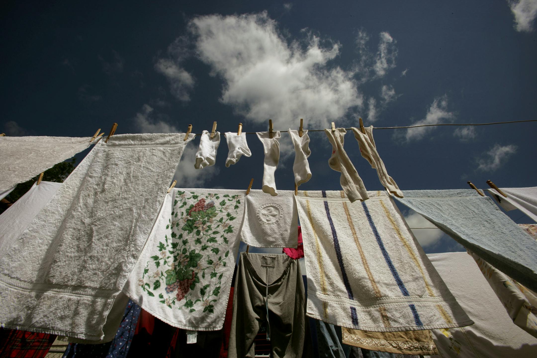 Clotheslines save money, conserve electricity and burn calories. They have also been banned in several suburbs and neighborhoods.