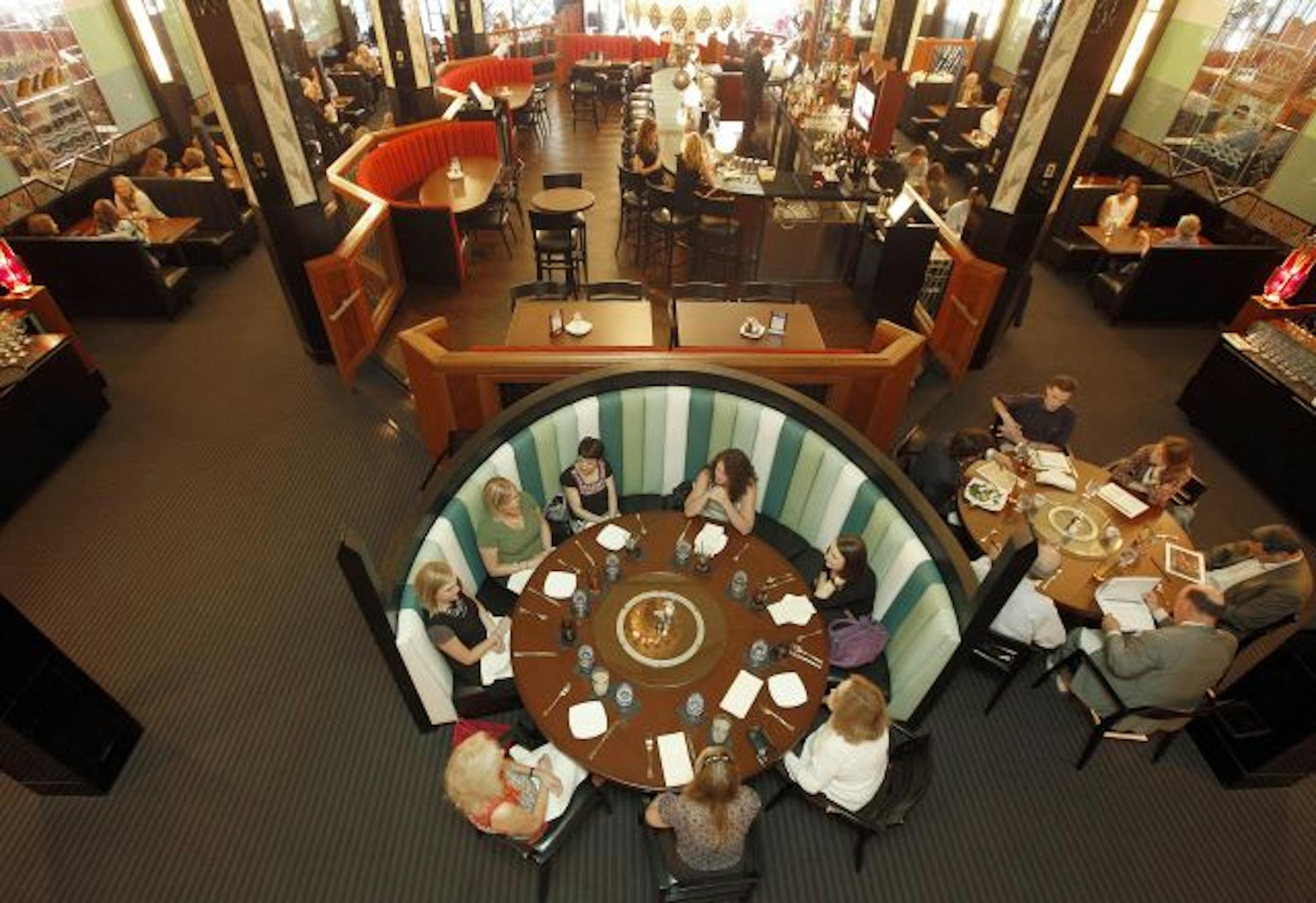 In the former Forum Cafeteria, a new raised bar and a large banquette fill the space where diners once lined up with their trays. The Art Deco decor dates to 1930.