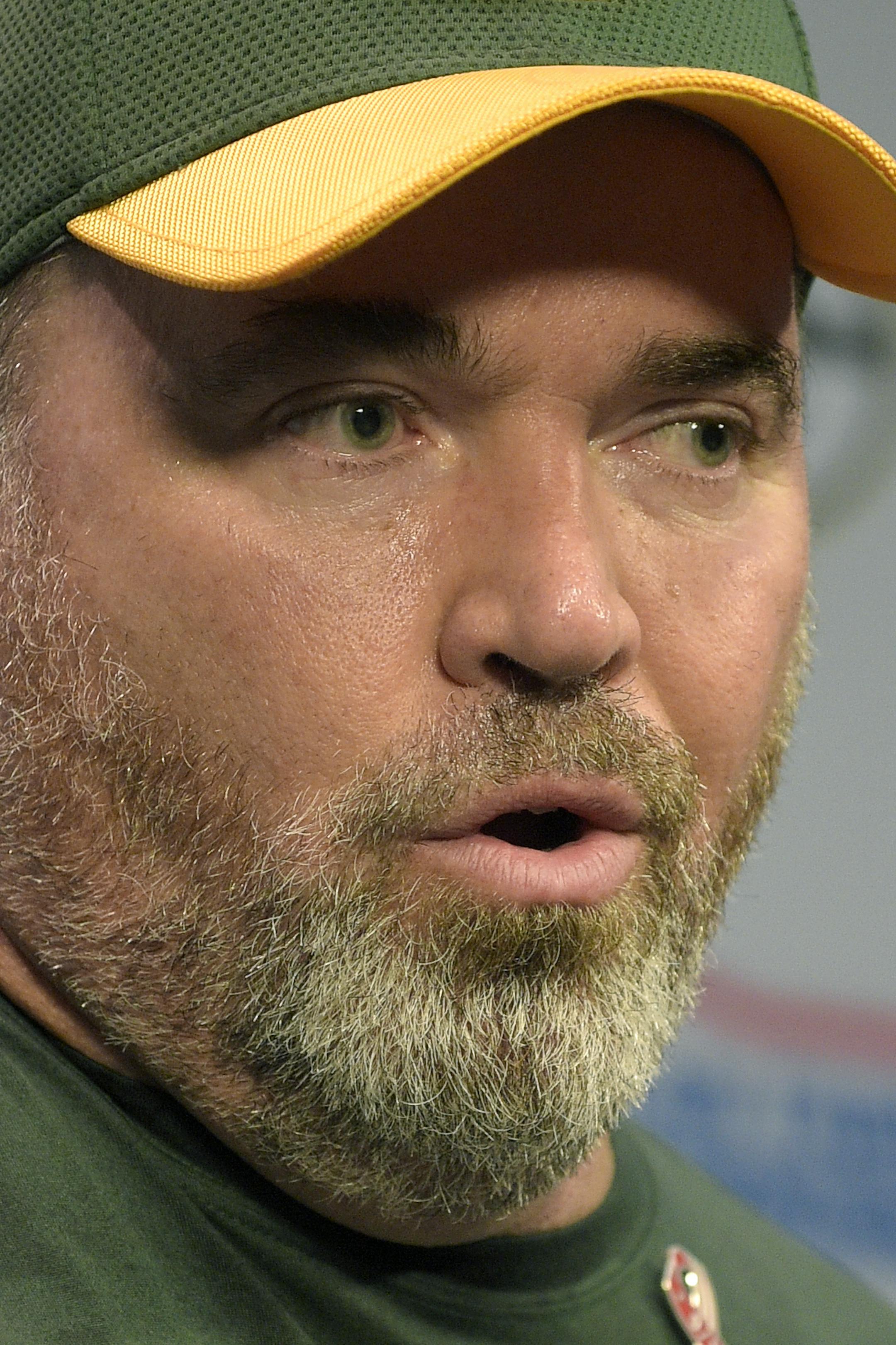 Green Bay Packers head coach Mike McCarthy answers questions from reporters during a news conference after an NFL football game against the Jacksonville Jaguars in Jacksonville, Fla., Sunday, Sept. 11, 2016. The Packers won 27-23. (AP Photo/Phelan M. Ebenhack)