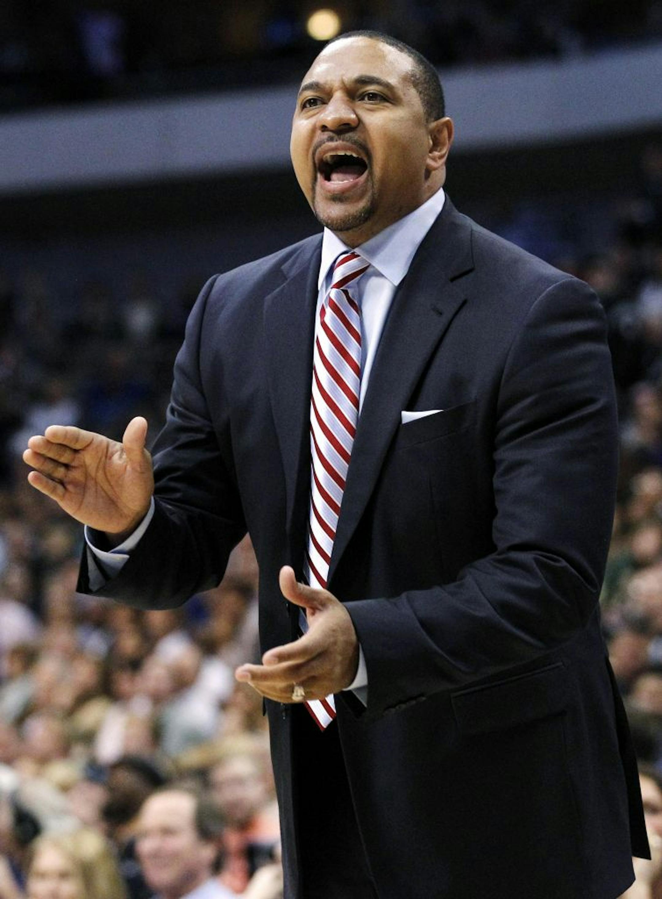 Golden State Warriors head coach Mark Jackson instructs his team in the second half of an NBA basketball game against the Dallas Mavericks, Monday, Nov. 19, 2012, in Dallas. The Warriors won 105-101 in overtime.