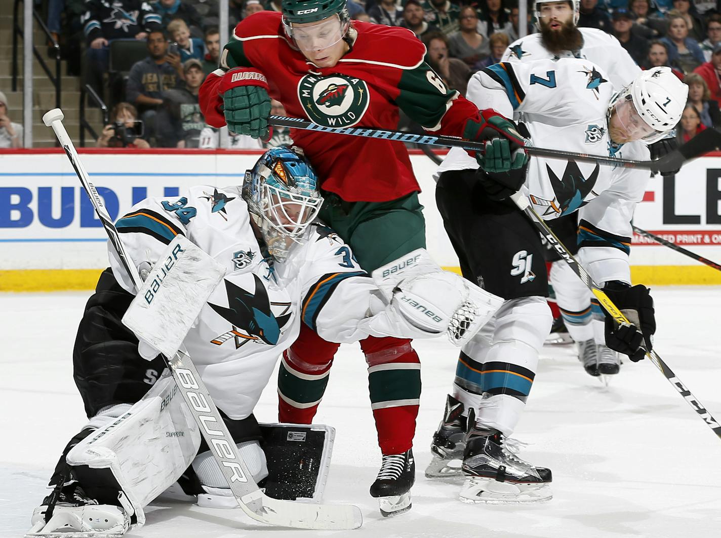 San Jose Sharks goalie James Reimer (34) got tangled up with Mikael Granlund (64) in the second period. ] CARLOS GONZALEZ cgonzalez@startribune.com - April 5, 2016, St. Paul, MN, Xcel Energy Center, NHL, Hockey, Minnesota Wild vs. San Jose Sharks