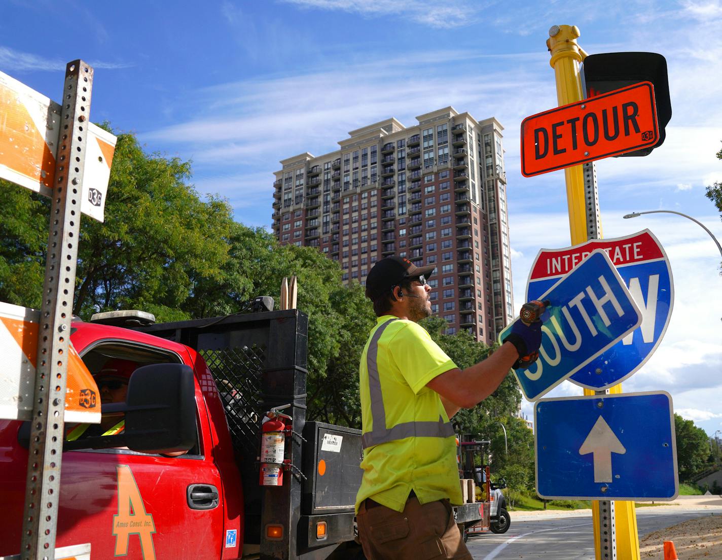 PJ Pitschka, a traffic control supervisor with Warning Lites, moved a sign into place as workers put the the finishing touches on a key ramp leading to southbound I-35W from 10th Street and 4th Avenue South Wednesday. ] ANTHONY SOUFFLE &#x2022; anthony.souffle@startribune.com Workers put the the finishing touches on a key ramp leading to southbound I-35W from 10th Street and 4th Avenue South Wednesday, Sept. 25, 2019 in downtown Minneapolis. The Minnesota Department of Transportation is expected