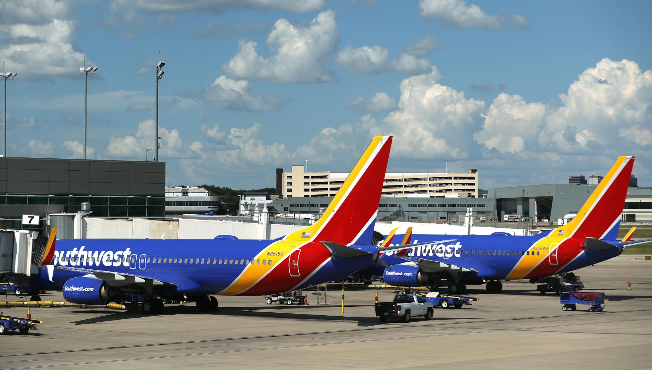 Southwest Airlines jets sit at gates at Love Field in Dallas, Wednesday, June 24, 2020. (AP Photo/Tony Gutierrez) ORG XMIT: OTKTG111