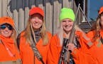 North of Hibbing this weekend, during the first-ever statewide youth deer hunt, Nancy Burkes, left, and Hillarie Glad, second from left, hosted Leah B