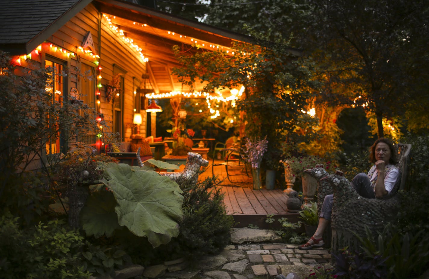 Wouterina de Raad's in her garden last summer. ] JEFF WHEELER &#xef; jeff.wheeler@startribune.com Artist Wouterina de Raad's garden is a showcase for her concrete mosaic sculptures on her farm in Beldenville, WI. Her gardens were photographed Tuesday, July 29, 2014.