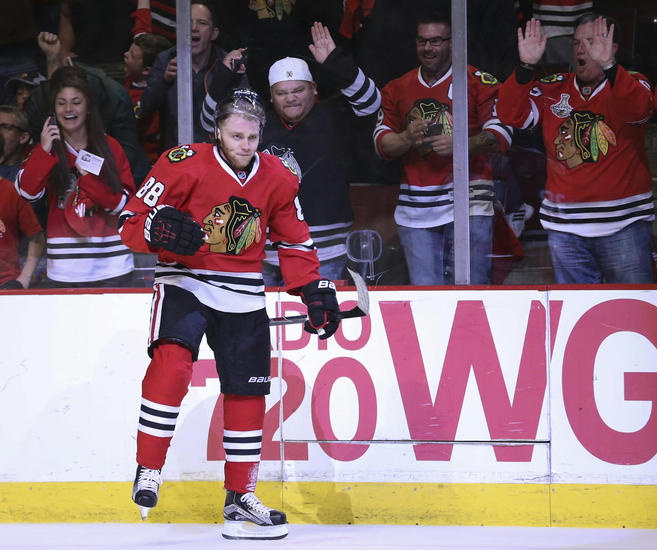 Blackhawks right wing Patrick Kane (88) reacted along with fans after he scored in the second period Sunday night. ] JEFF WHEELER &#xef; jeff.wheeler@startribune.com The Minnesota Wild and the Chicago Blackhawks met in the second game of their NHL playoff series Sunday night, May 3, 2015 at United Center in Chicago.