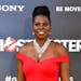 FILE - In this July 9, 2016 file photo, Leslie Jones arrives at the Los Angeles premiere of "Ghostbusters." &#xeb;Ghostbusters&#xed; and &#xeb;Saturda