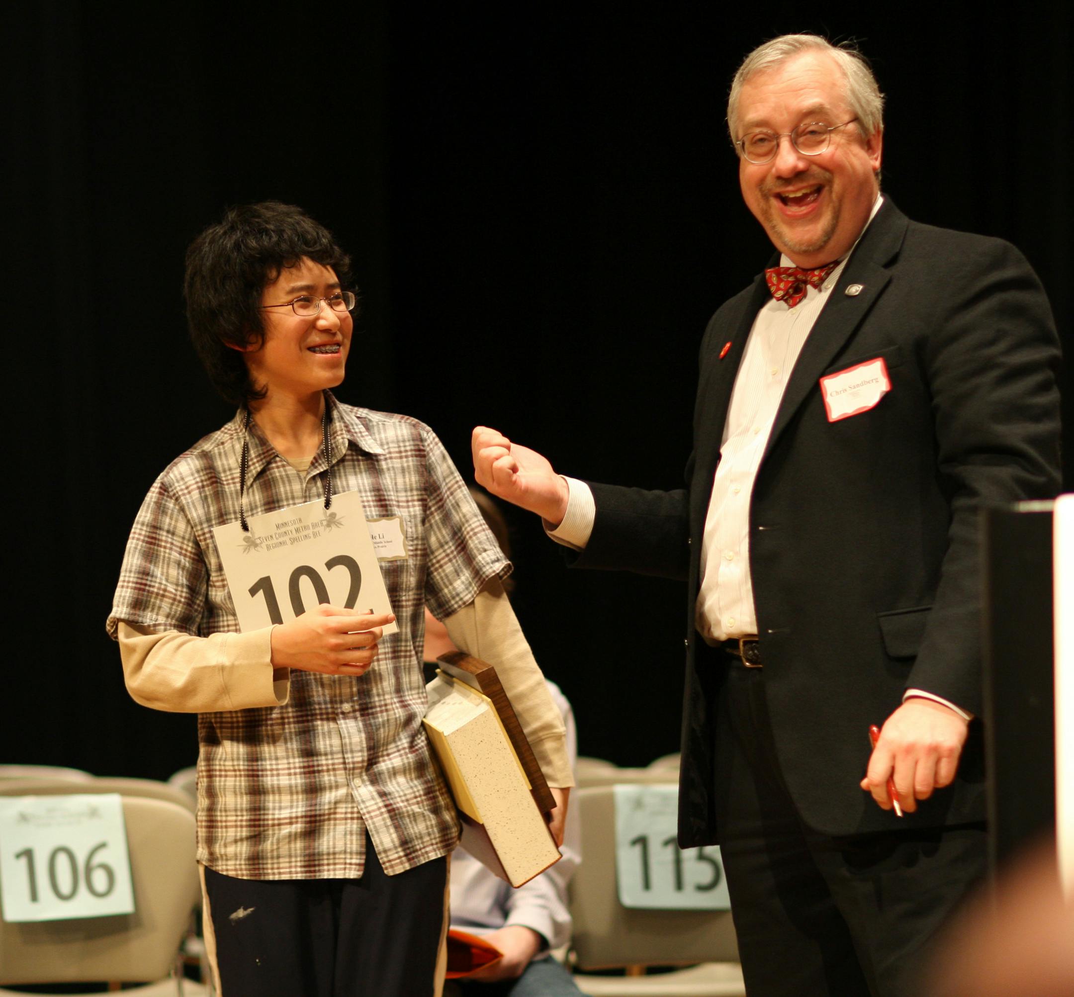 Organizer and prize presenter Christopher Sandberg joked with He Li, who beat 27 other young spelling experts to take first place. "I feel great," said Li, a student at Central Middle School in Eden Prairie. "I didn't expect to get this far." He will travel to the national tournament in Washington, D.C., in May.