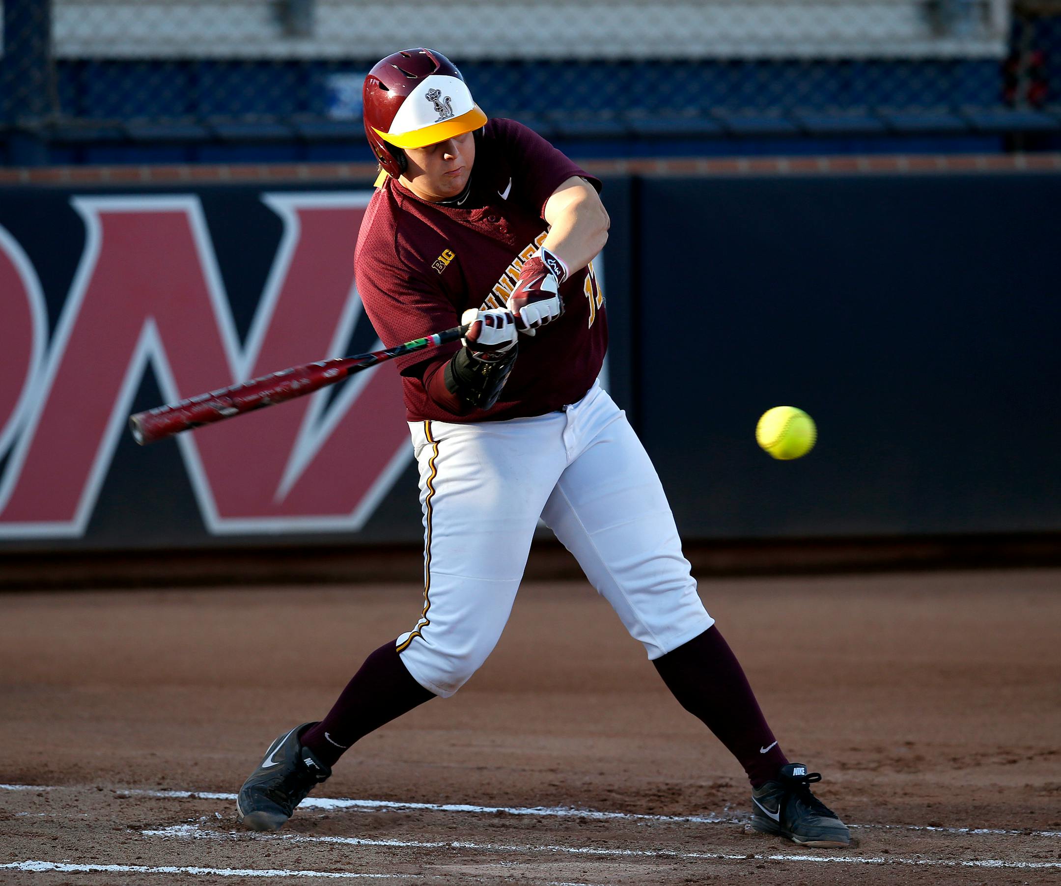 Minnesota's Sara Groenewegen singles in the first inning during an NCAA college softball tournament regional game against New Mexico State, Saturday, May 16, 2015, in Tucson, Ariz. (AP Photo/Rick Scuteri)
