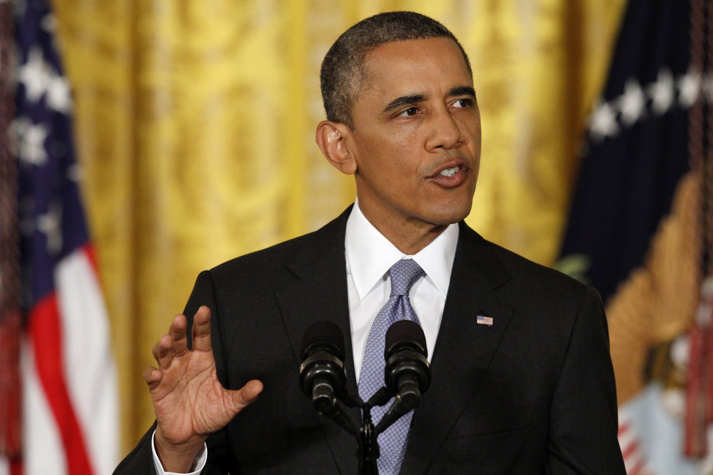 President Barack Obama speaks during a news conference in the East Room of the White House in Washington on Aug. 9, 2013.