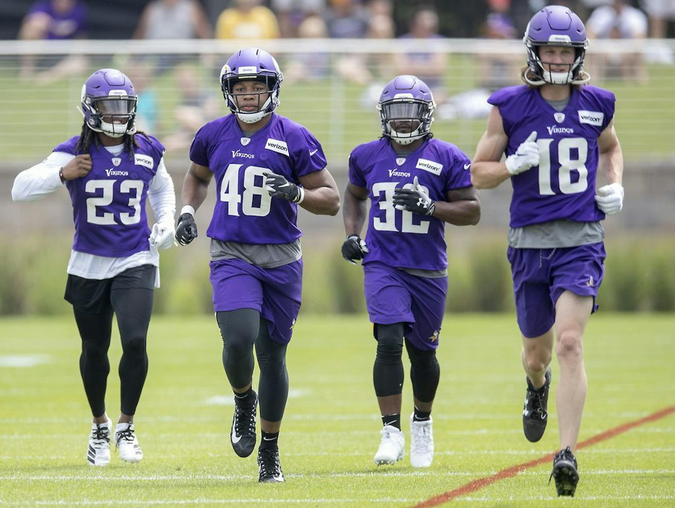 Minnesota Vikings Khari Blasingame, second from left, warmed up during the first full day of practice at Vikings training camp at the TCO Performance Center, Friday, July 26, 2019 in Eagan, MN.