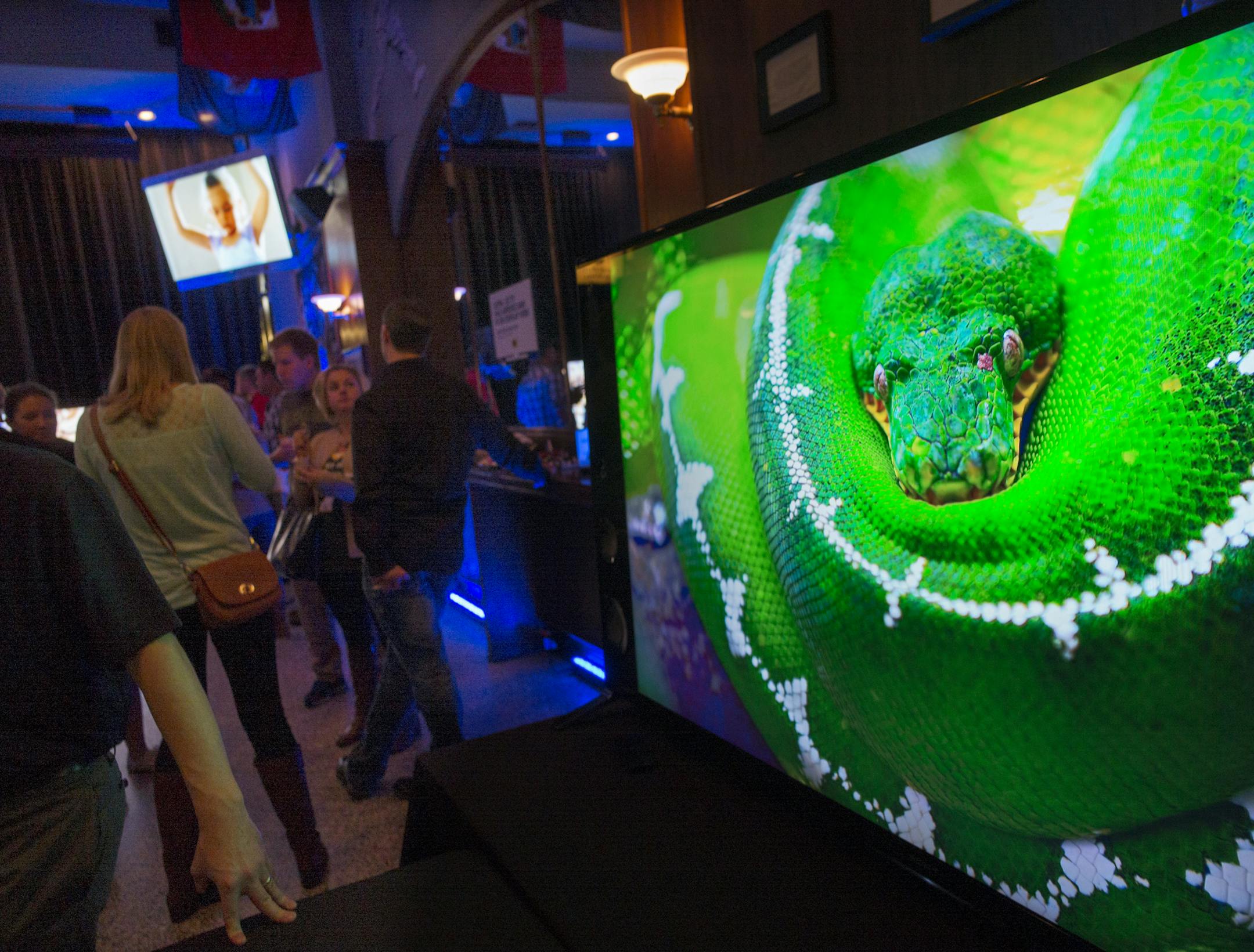This 4K Sony screen had a true to life quality that was startling.] On October 2, 2014 at Britt's Pub,This fall, Best Buy is taking its sales pitch directly to sports fans hanging out in bars. The idea is to show them in person the difference in 4K TVs while watching a big game. While Best Buy knows they are still too expensive to be a big holiday hit this year, they are trying to hype up the technology in the hopes it will be a homerun next year. .Richard Tsong-Taatarii/rtsong- taatarii@startri
